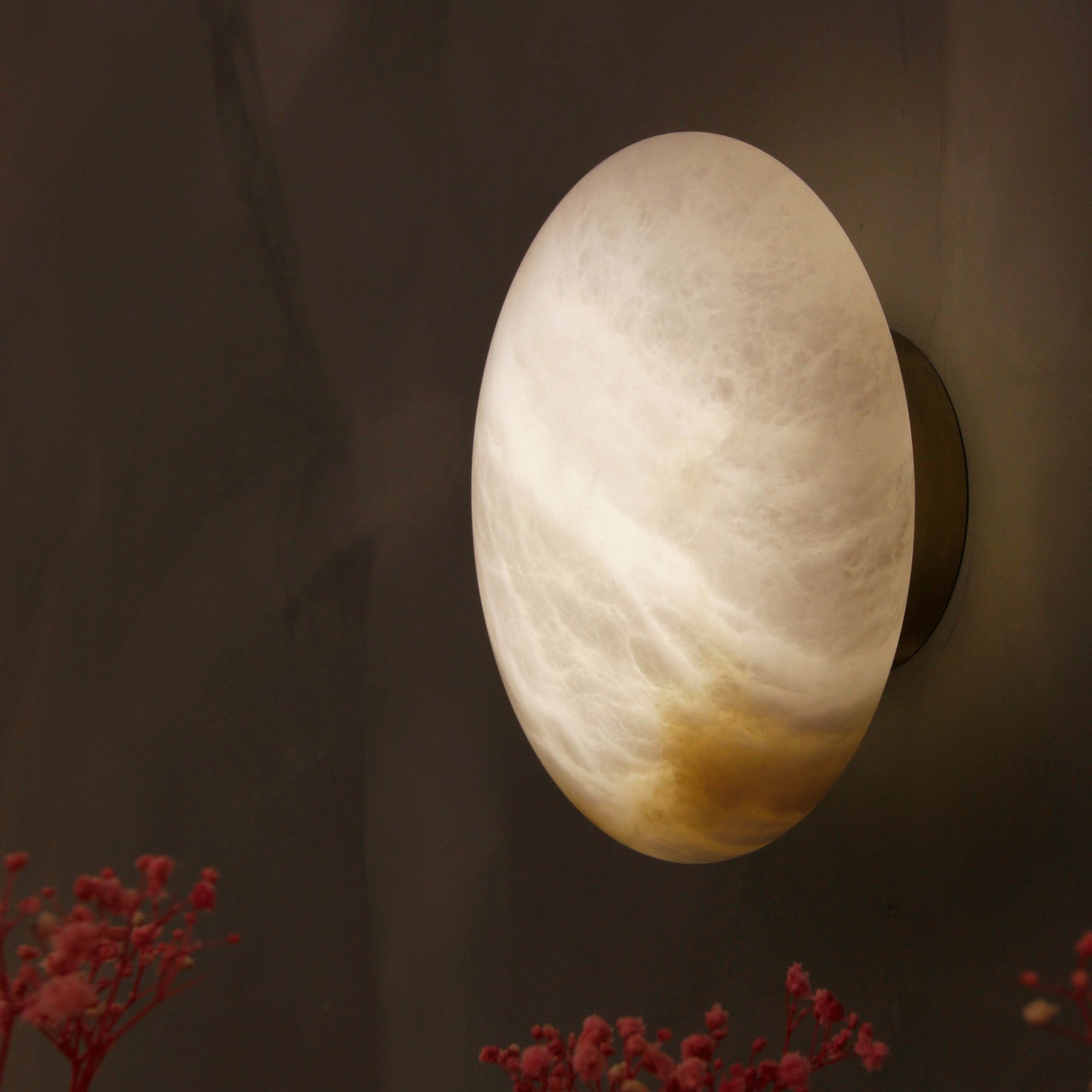 como marble wall light styled in contemporary interior with soft ambient lighting