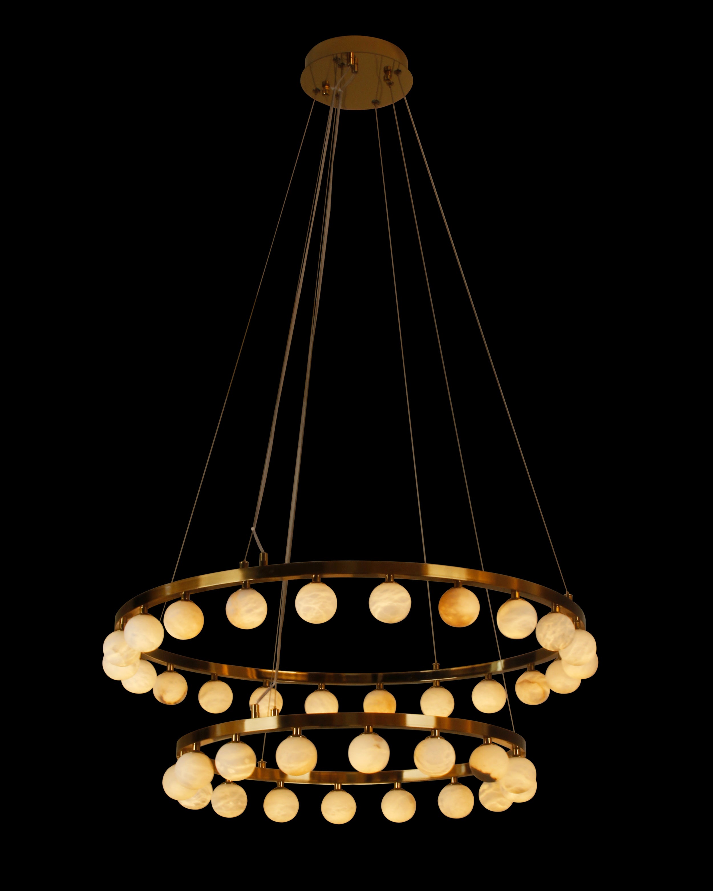 Orbit Double Ring Chandelier displaying cosmic elegance and symmetrical design.