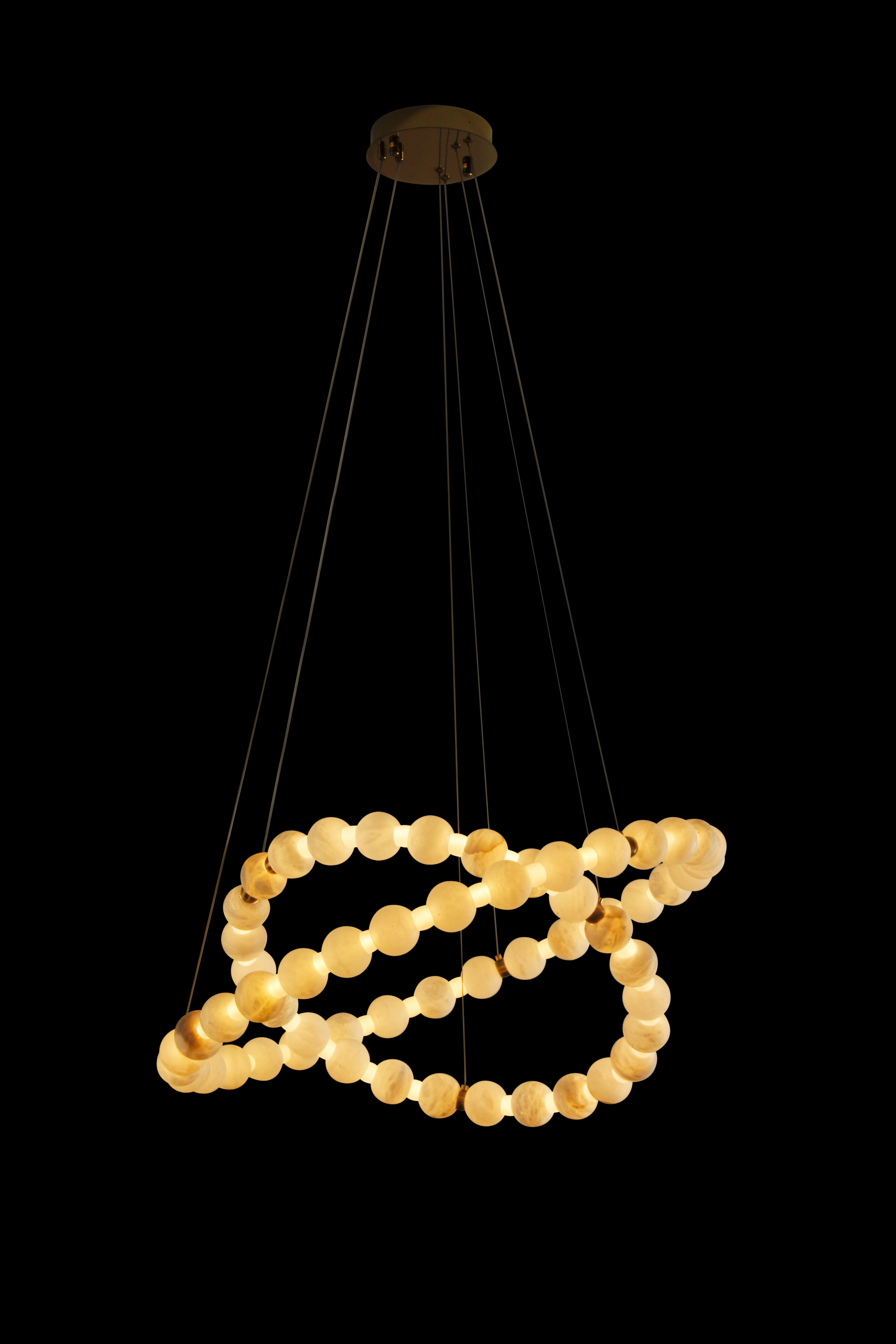 VORELLI® Orbella Double Ring Chandelier, a sculptural luxury lighting fixture with glowing marble spheres.
