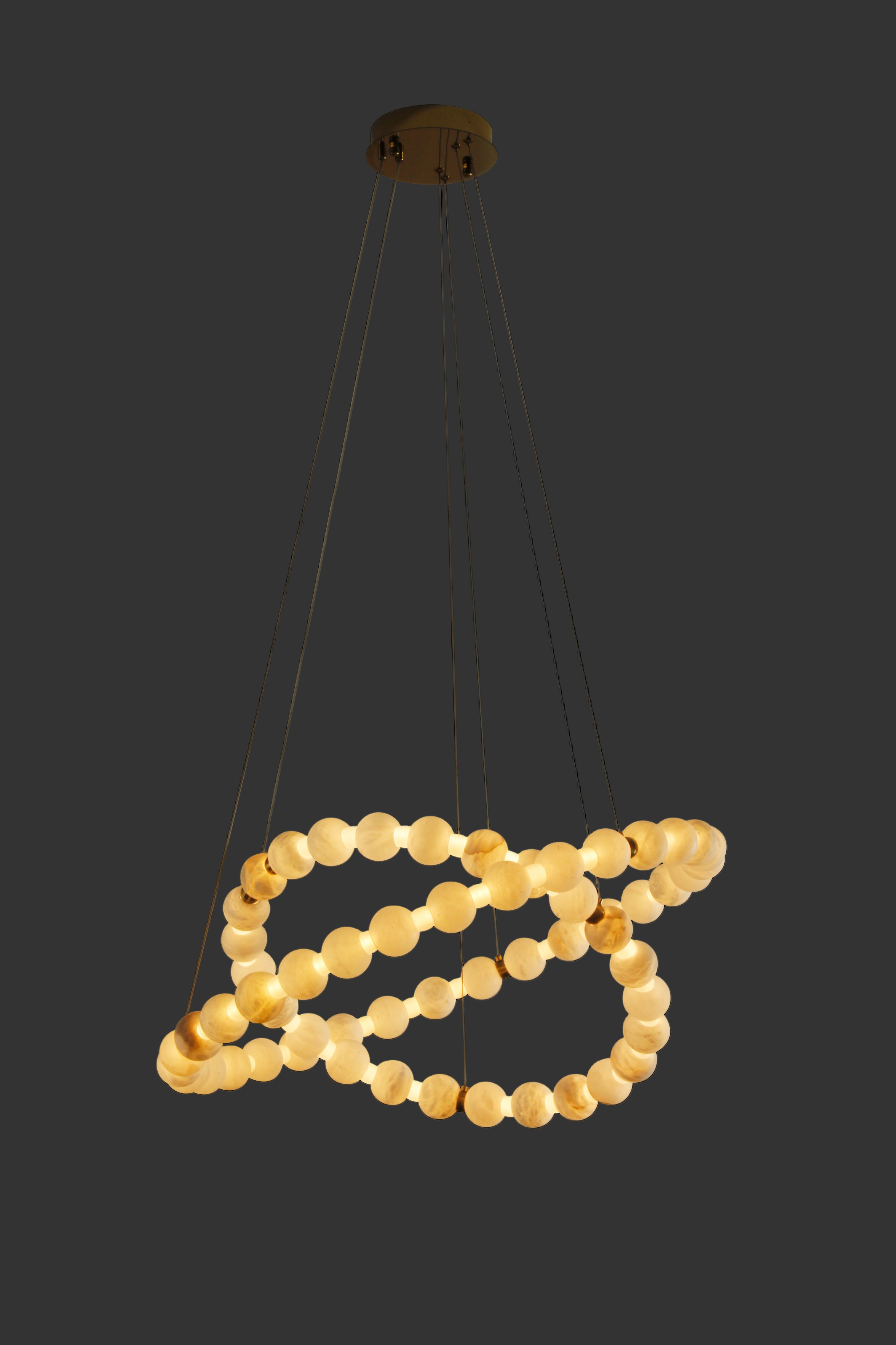 VORELLI® Orbella Double Ring Chandelier, a sculptural luxury lighting fixture with glowing marble spheres.