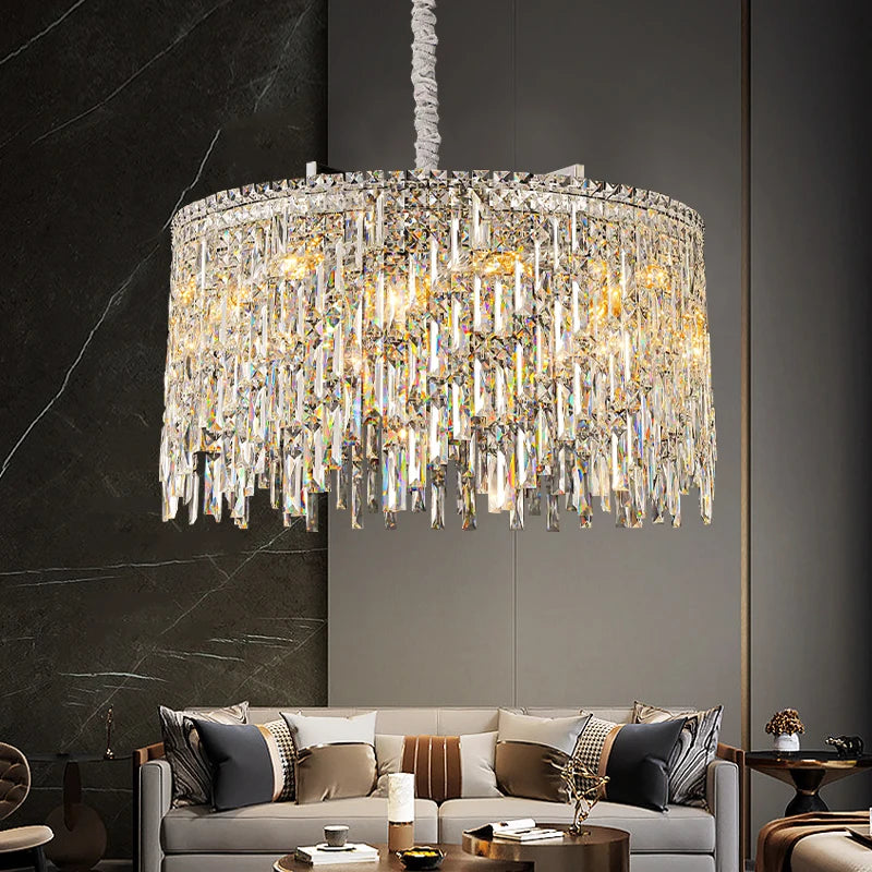 Luxury circular crystal chandelier with cascading diamond-cut faceted crystals, creating statement ambient lighting in a refined modern living space