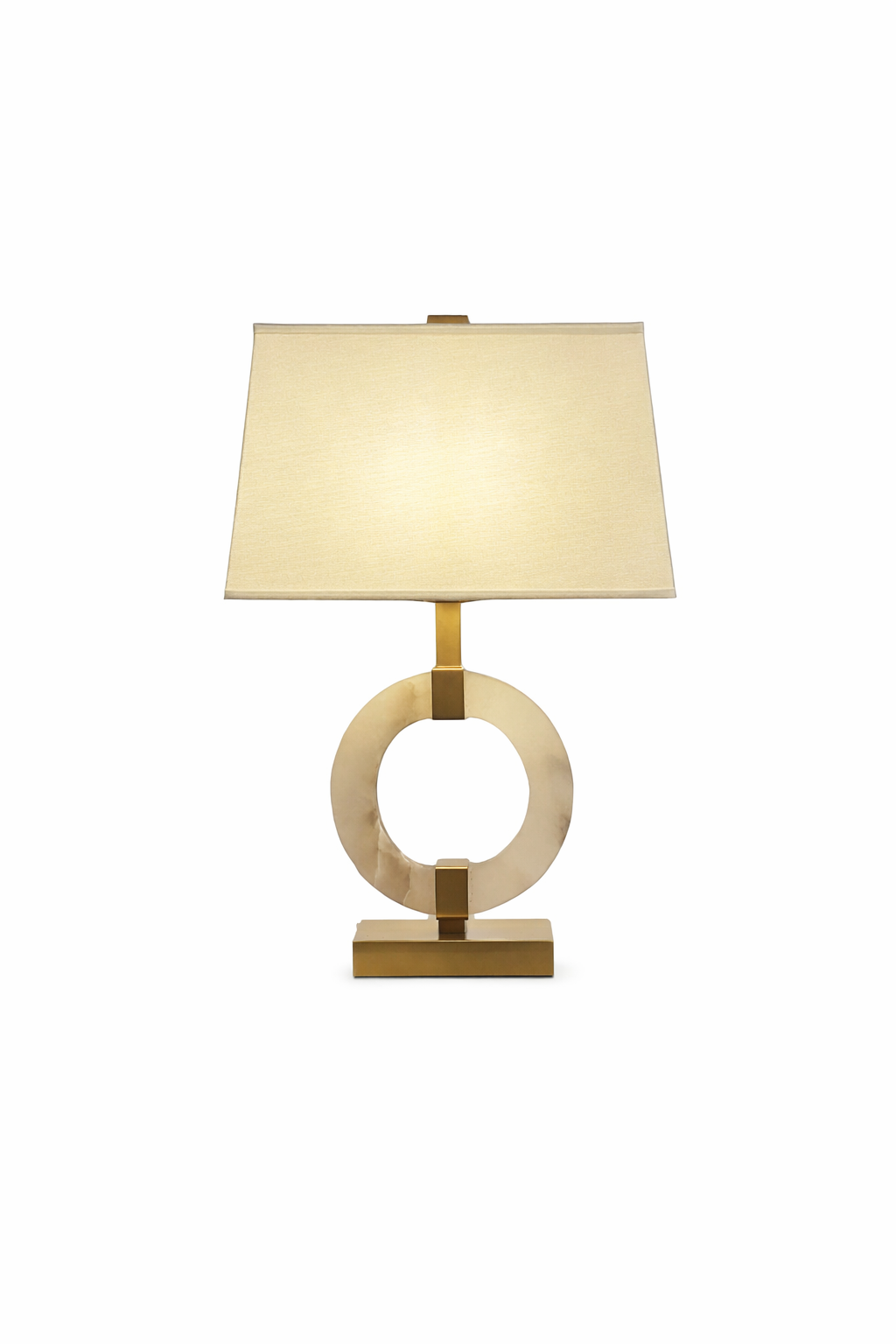Luxury circular marble table lamp with gold metal frame, cream fabric rectangular shade, and polished stone base, isolated on pure white background