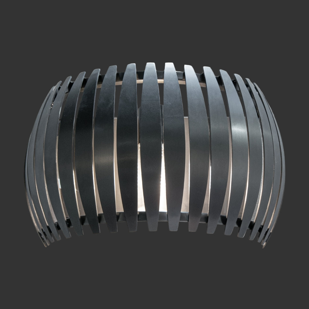 VORELLI Zeus IP65 wall light in a sleek, curved antique brass finish.