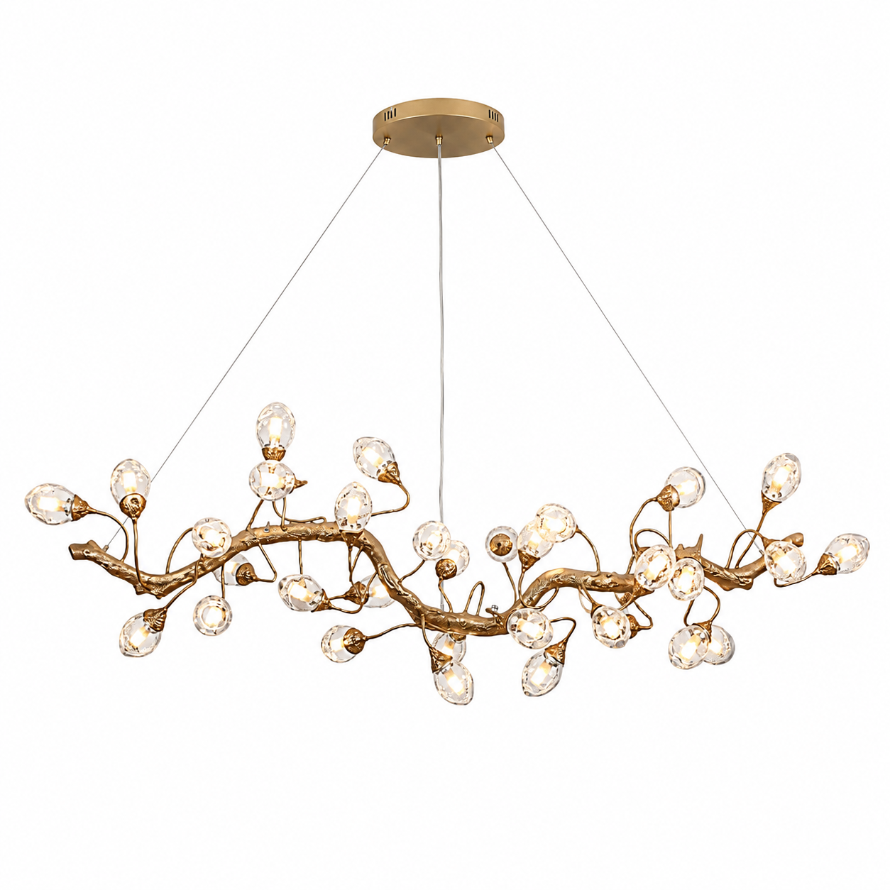 A close-up shot of the Tremezzo Rectangular Chandelier showing the intricate details of the softly illuminated glass elements and the elegant branching form.
