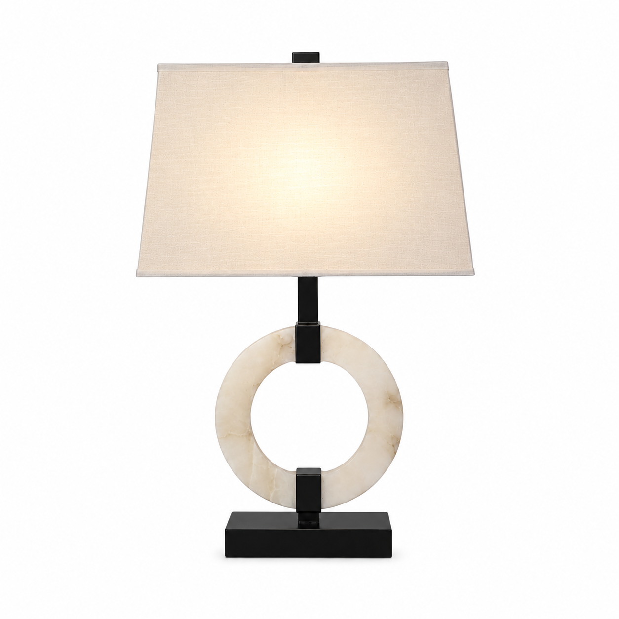 A curated interior scene where the Anello Marble Lamp serves as a sculptural focal point amidst luxury home accessories.