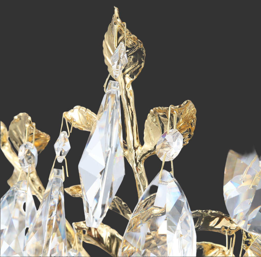 A detailed view highlighting the refined craftsmanship of the VORELLI Dewdrop Chandelier, capturing the opulent mood created by light reflecting through the cascading crystal drops.