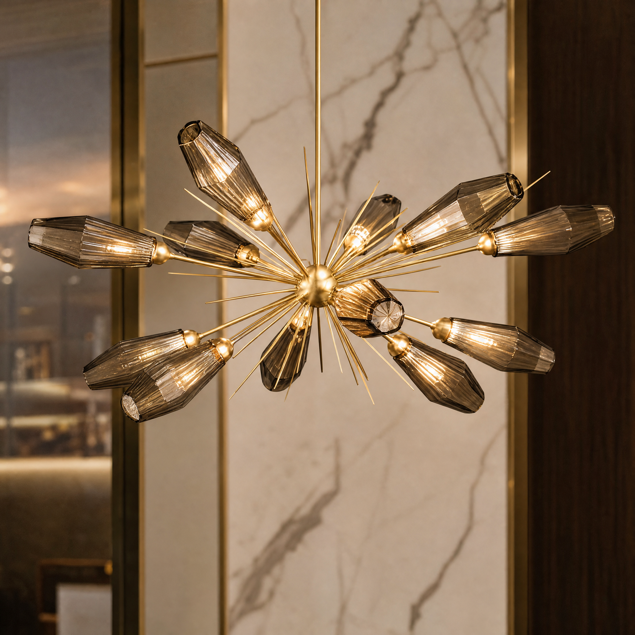 A detailed view of the VORELLI Abdera Pendant Light showcasing the intricate harmony of sculptural spikes and smoky grey glass components.