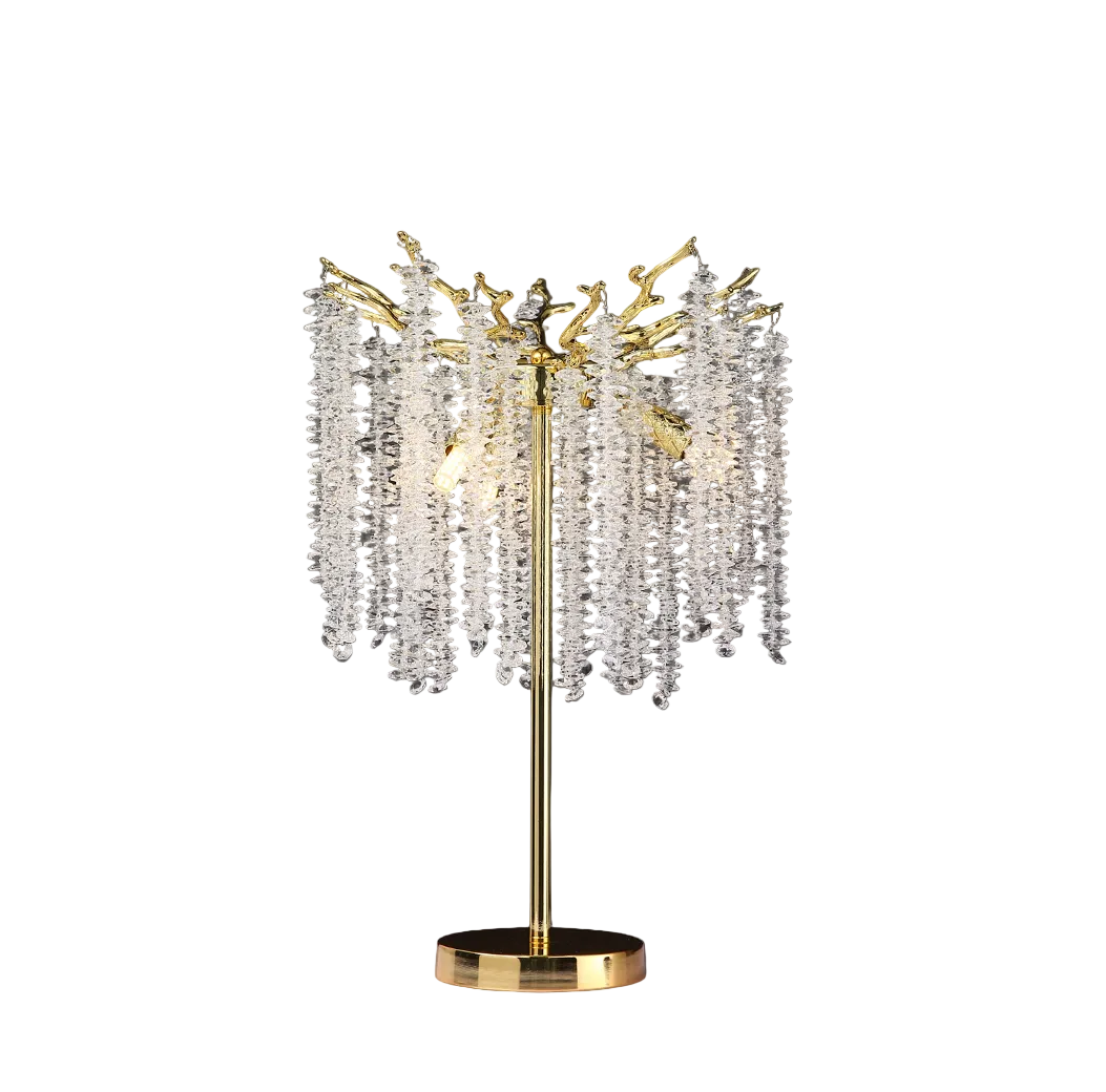A mood-focused view of the VORELLI Wisteria Table Lamp, highlighting the gentle movement of crystal strands and the opulent atmosphere created by its premium ambient light.