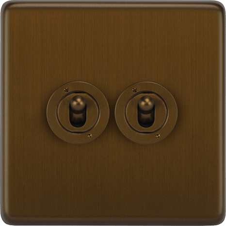 A VORELLI Victorian toggle switch mounted on a textured wallpaper background.