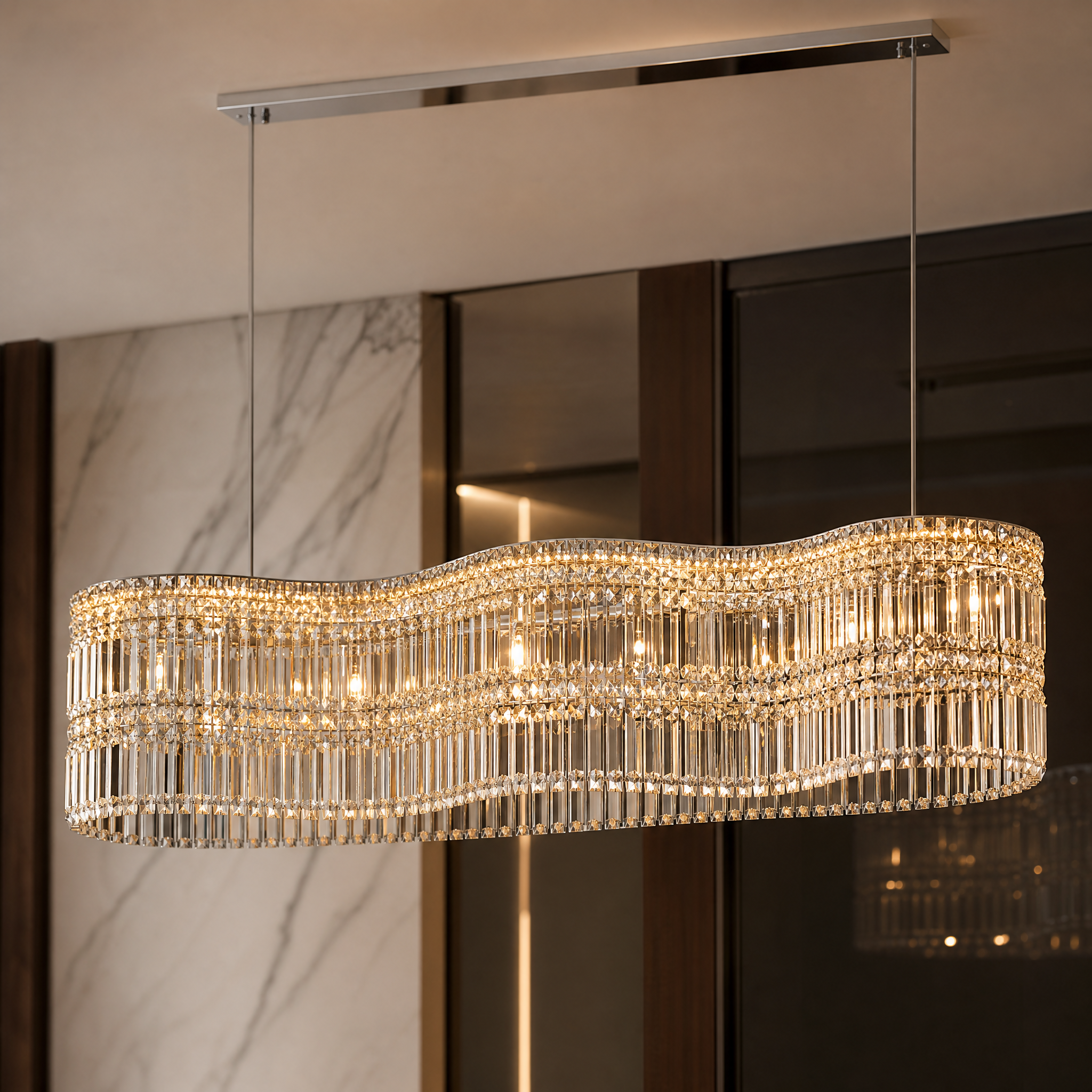 Macro closeup of the diamond-cut faceted crystals on the VORELLI Abruzzi Rectangular Chandelier II, capturing the brilliant light refraction.