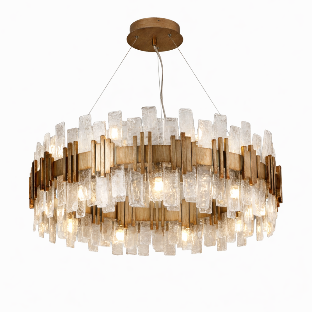 Luxury circular chandelier with layered cracked crystal glass panels surrounding a brushed warm-tone frame, suspended by fine cables from a round ceiling plate and illuminated with soft warm light, isolated on a pure white background.