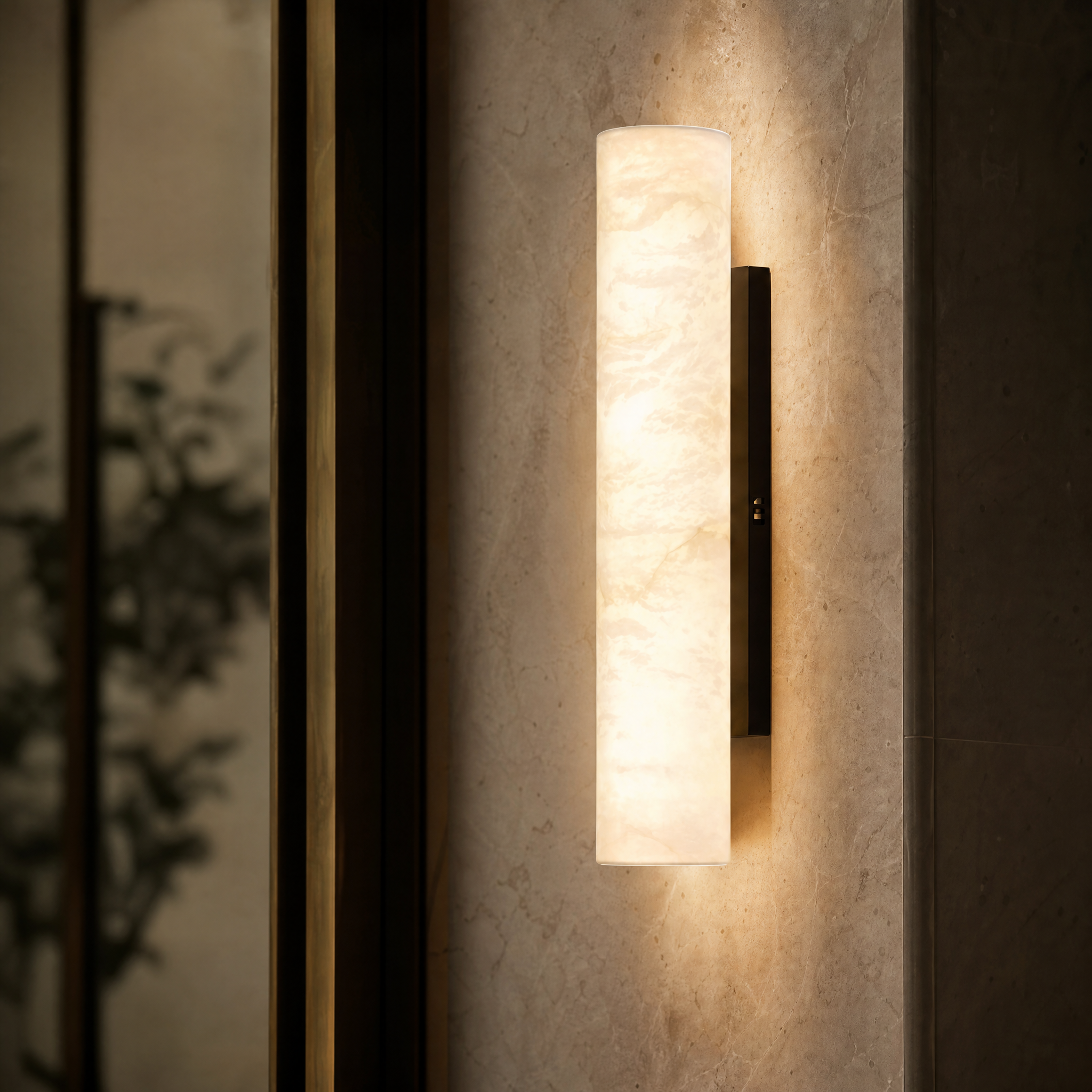 A macro closeup shot of the VORELLI Alvara Marble Wall Light highlighting the natural veining and premium texture of the marble.