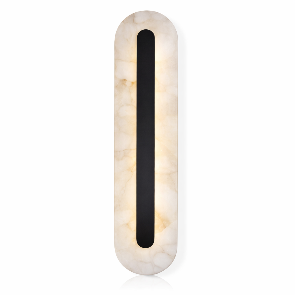 An atmospheric display of the Treviso Marble Wall Sconce, highlighting how its refined depth and warm tones enrich contemporary interior designs.