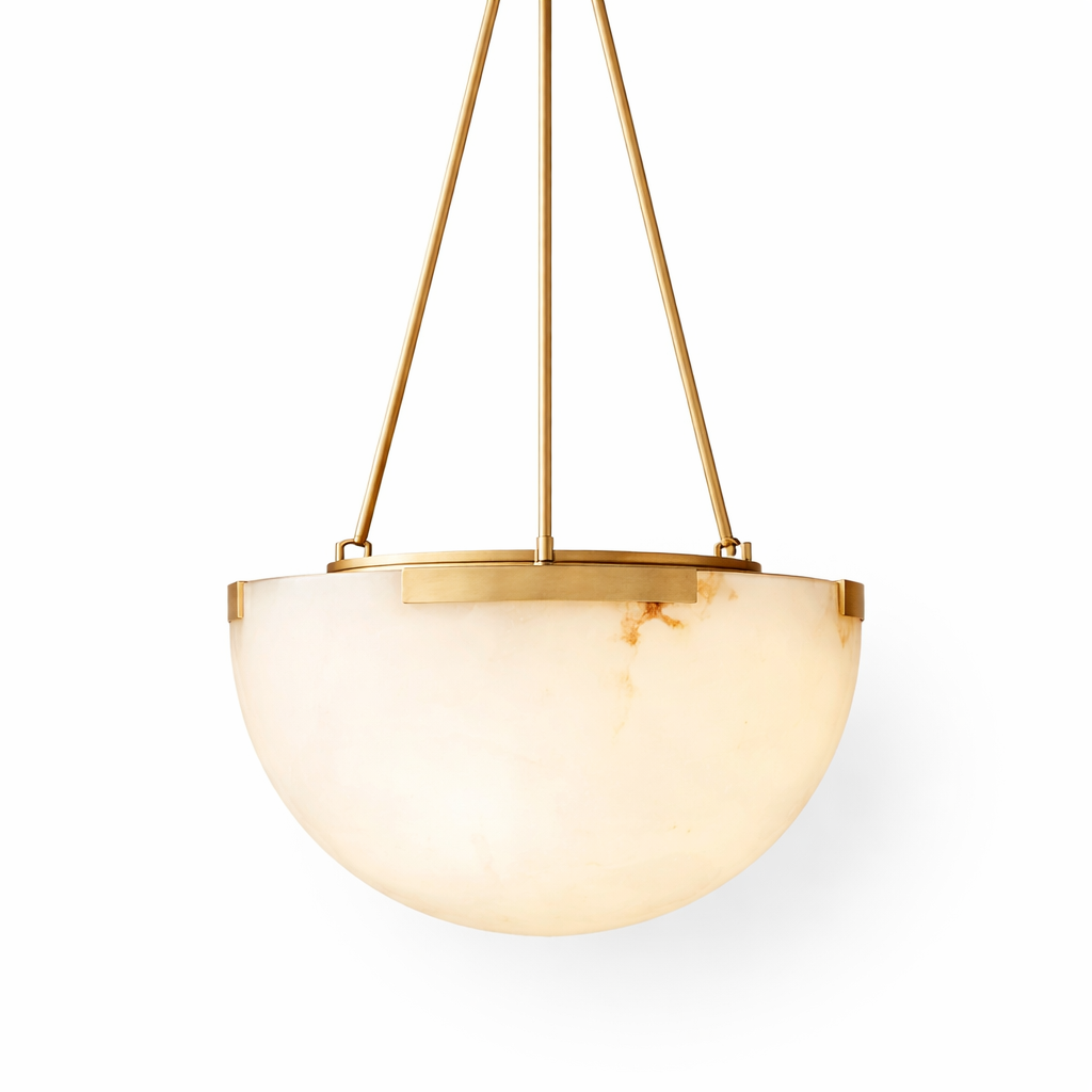 An atmospheric mood shot of the VORELLI Roma marble pendant light, emphasizing its rich, warm diffused glow against a moody, contemporary backdrop.