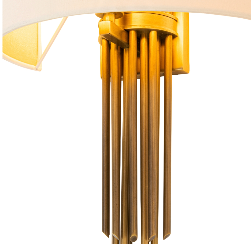 An atmospheric shot of the Castello Wall Light by VORELLI in an upscale hospitality setting, showcasing its understated luxury and sophisticated design.