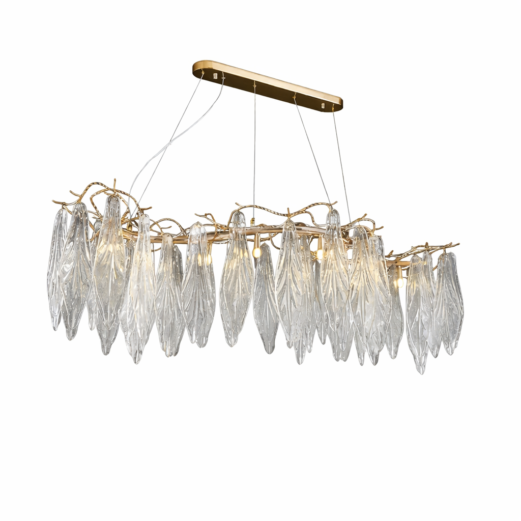 Artistic detail of the Larvotto rectangular chandelier by VORELLI highlighting the sculptural brass branches and delicate glass leaves.