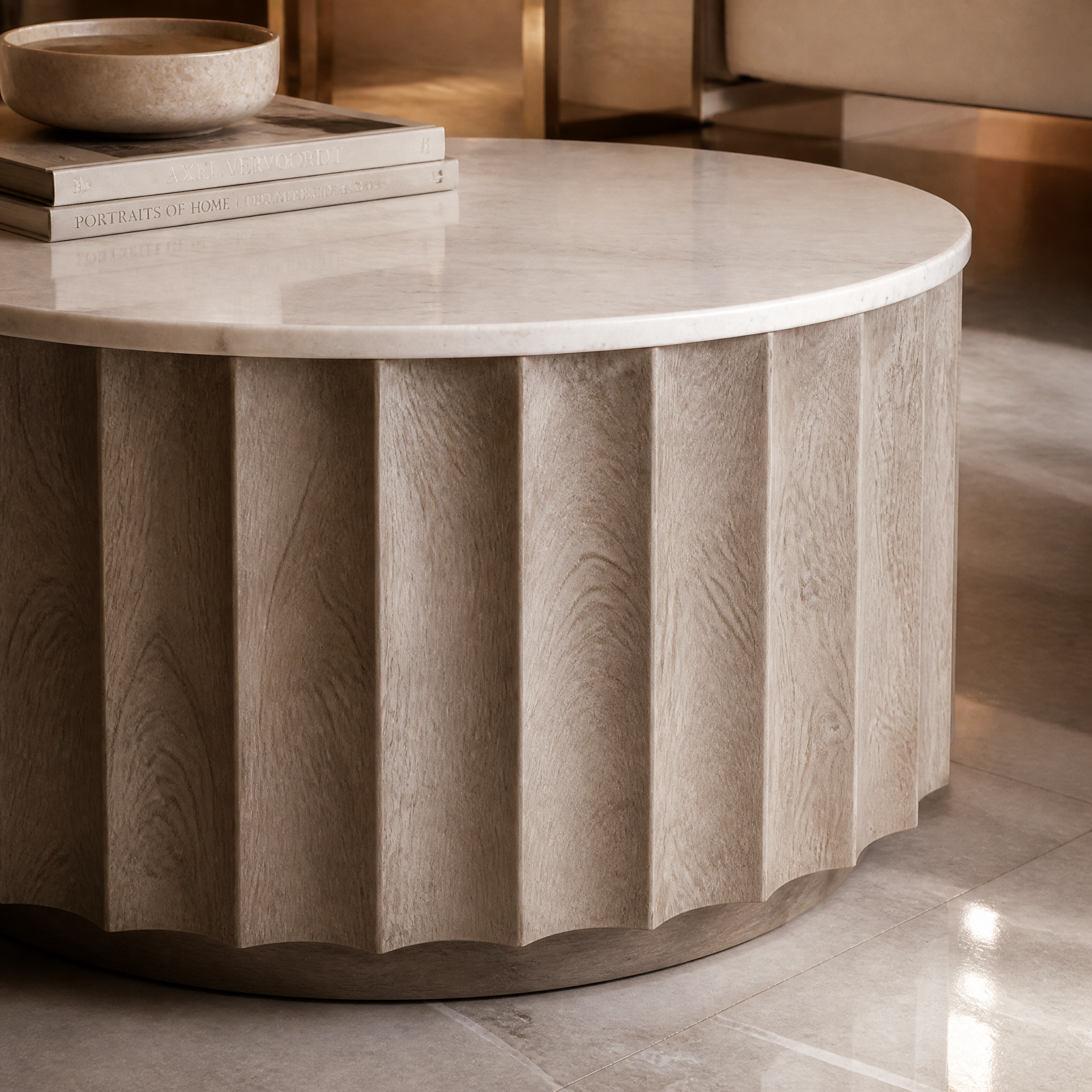 Close-up detail of the Astreva coffee table highlighting the tactile architectural depth of the stonewash finish and vertical fluted panelling.