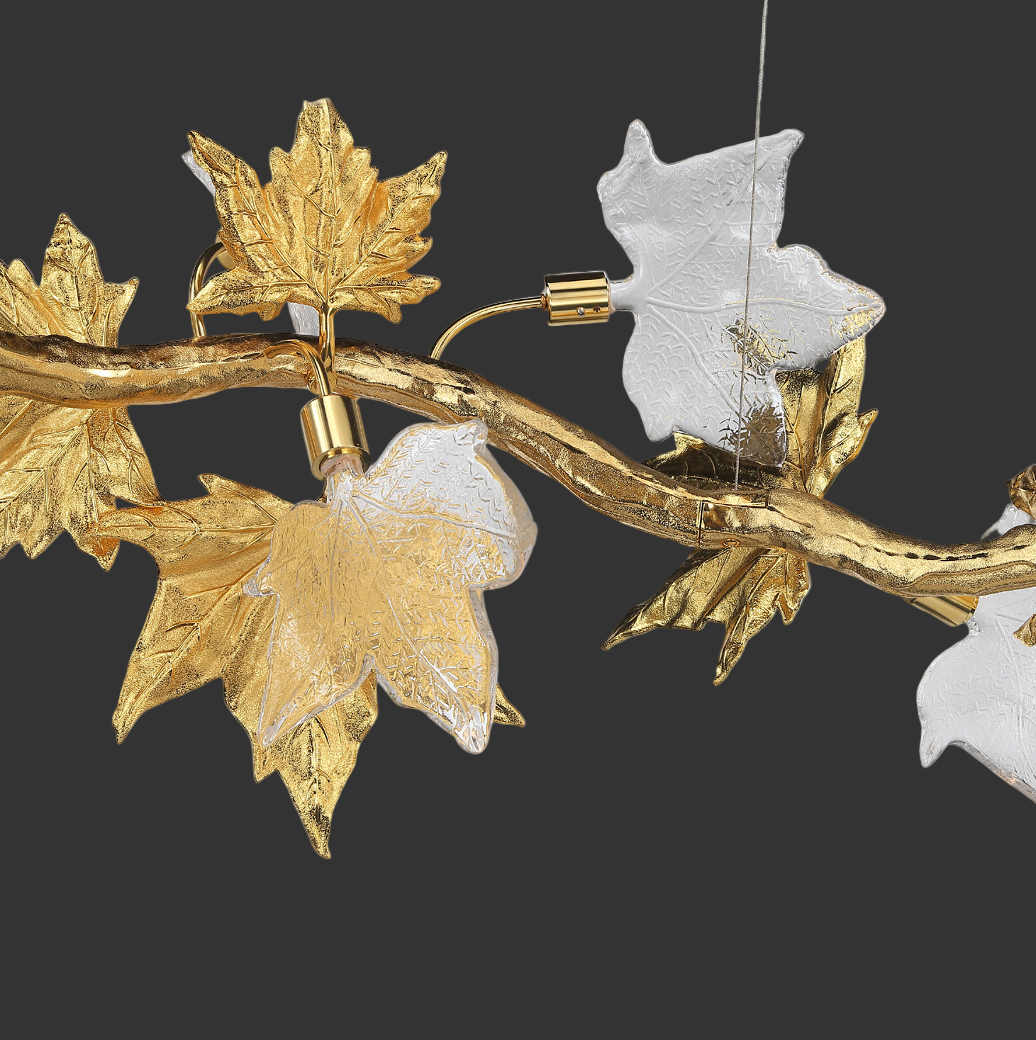 Atmospheric mood lighting from the VORELLI Maple Grove Circular Chandelier III, emphasizing the delicate layers of leaves and sophisticated luxury interior presence.