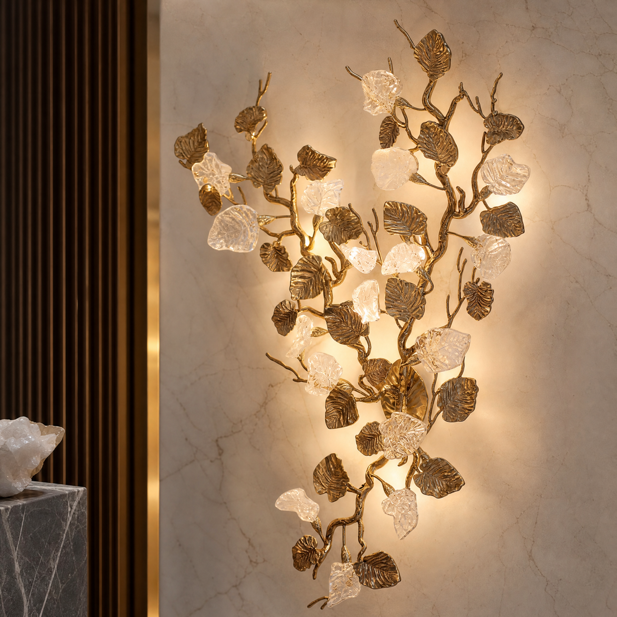 Closeup shot of the VORELLI Aura Leaf Wall Light highlighting the detailed texture of the delicately shaped glass leaves.