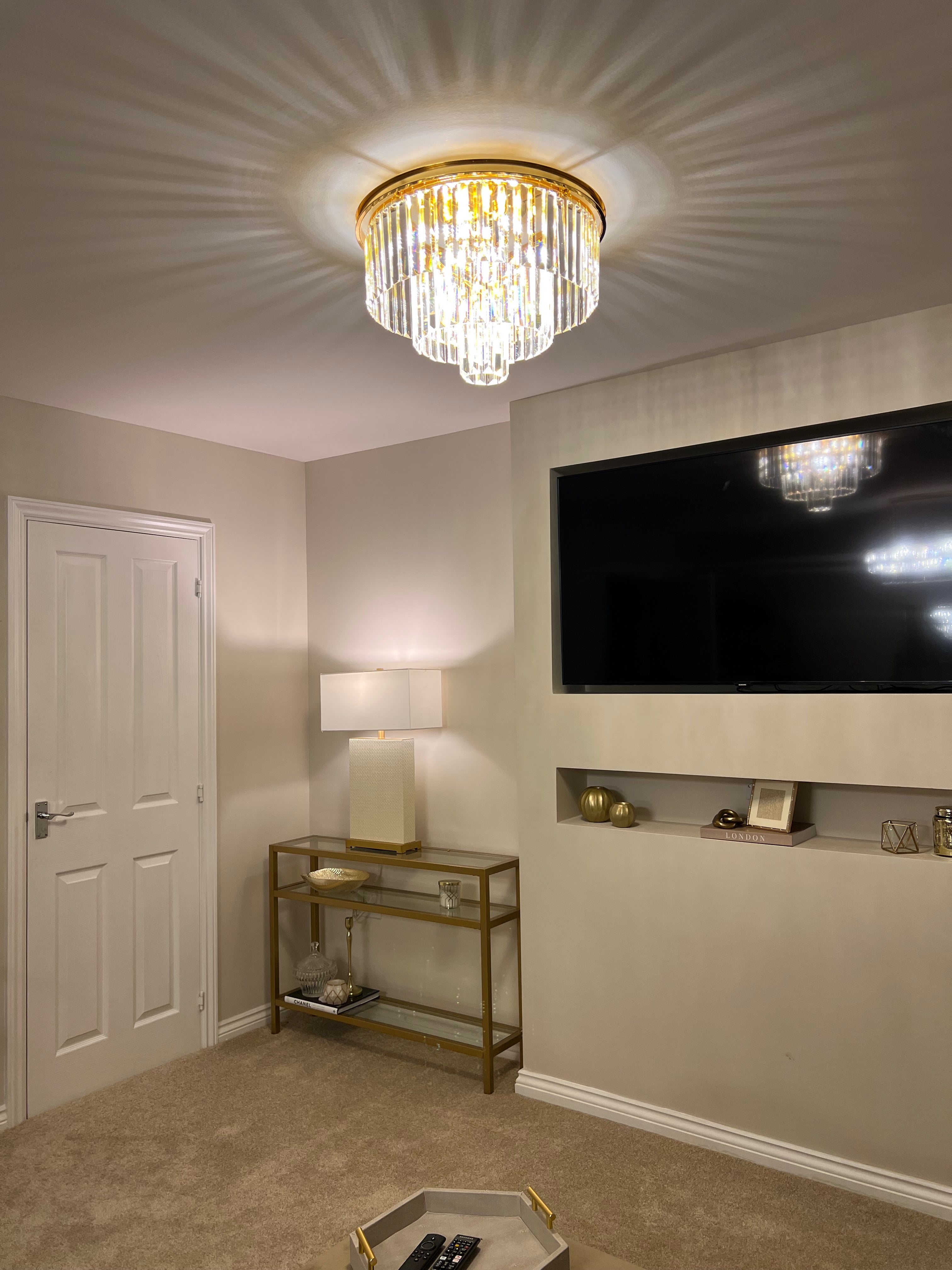 Close-up of Beckenham ceiling light showcasing precision diamond cut crystal prisms