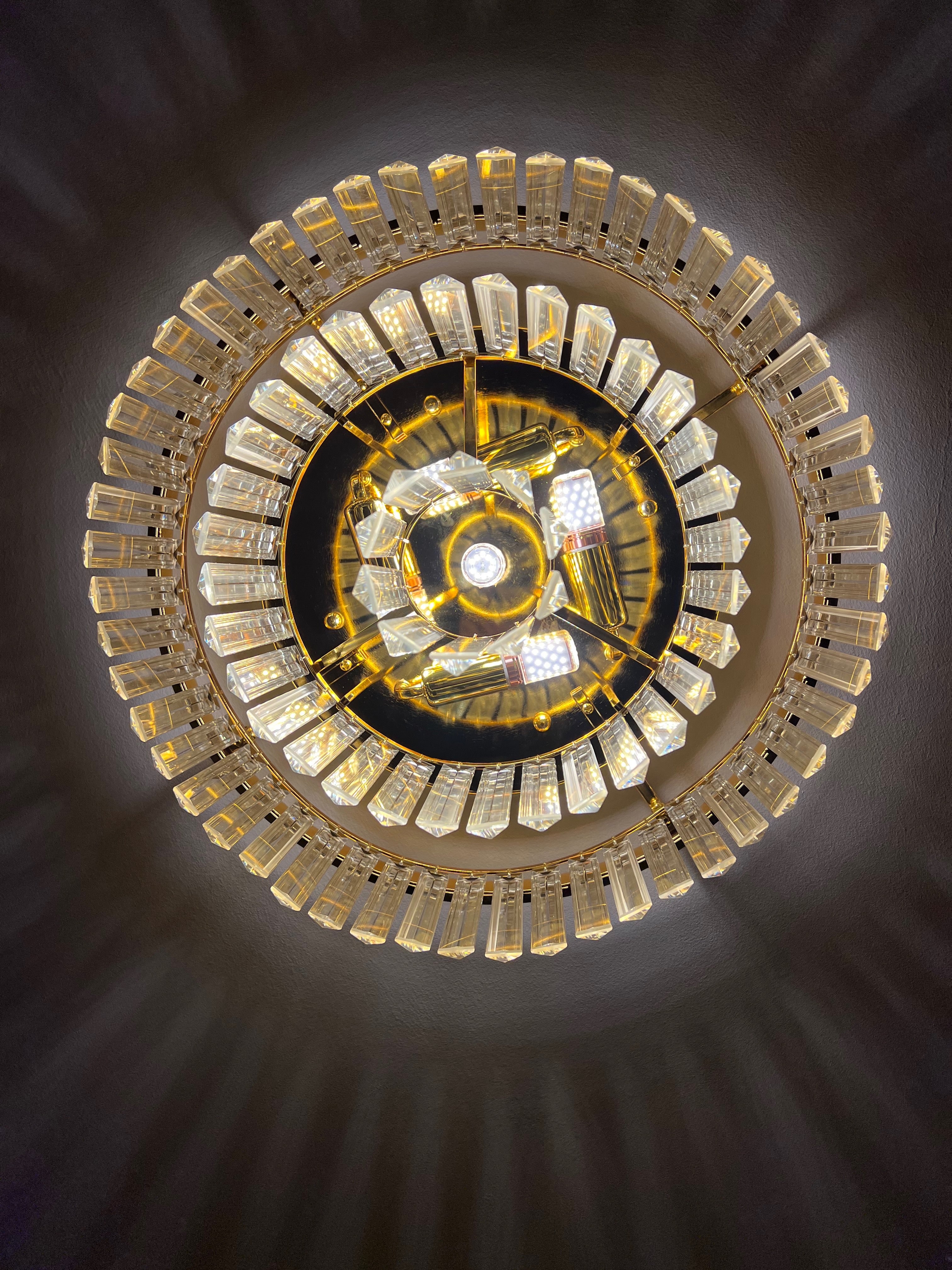 Beckenham ceiling light installed in a luxury bedroom interior with crystal detailing