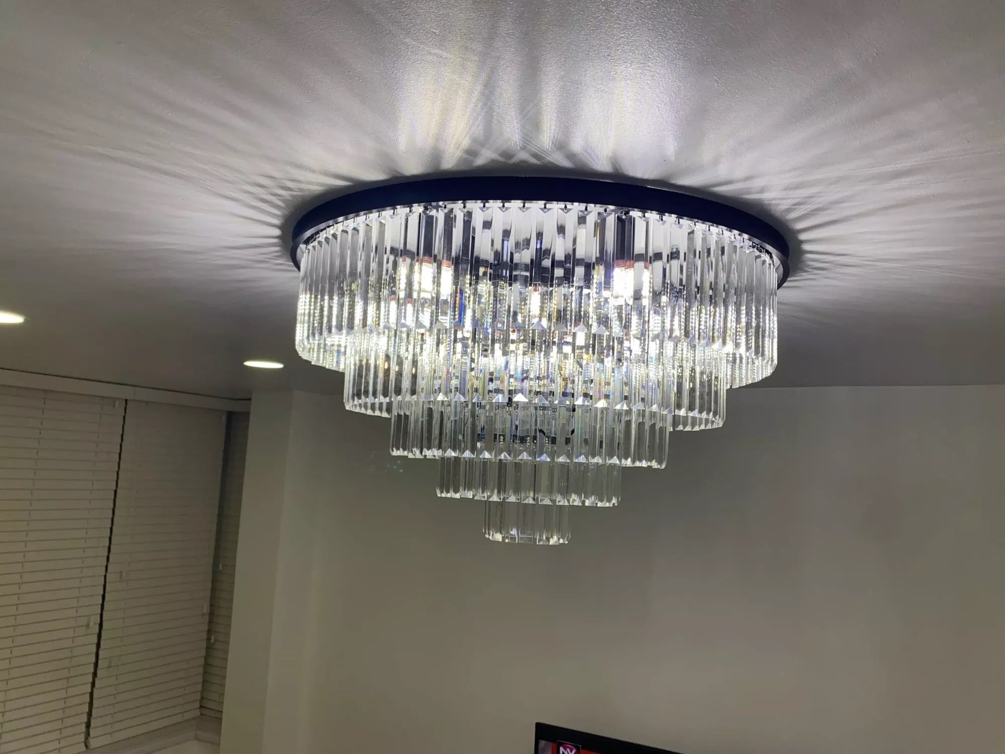 Statement Beckenham ceiling light featuring layered crystal tiers and luxury finish