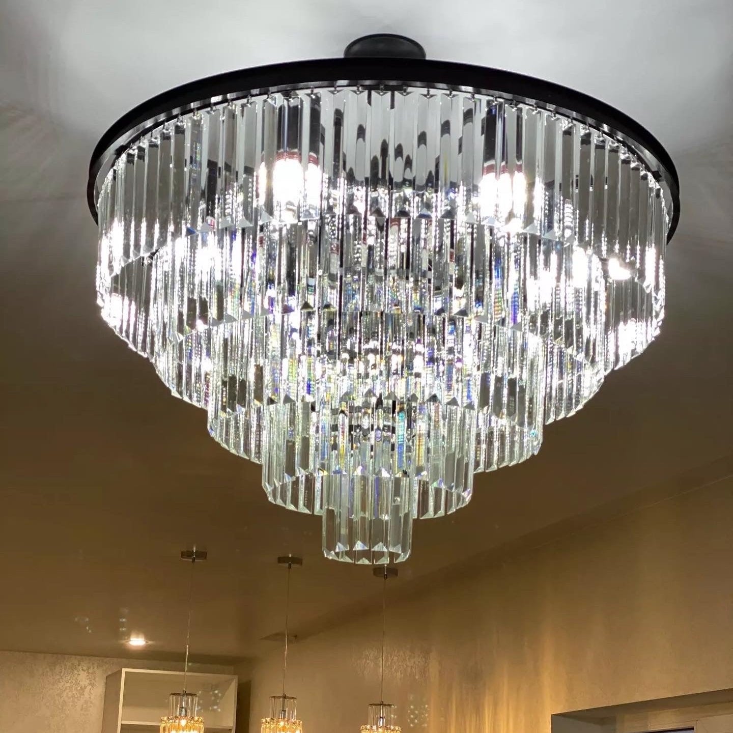 Close-up of Beckenham circular chandelier with layered diamond cut crystal detailing