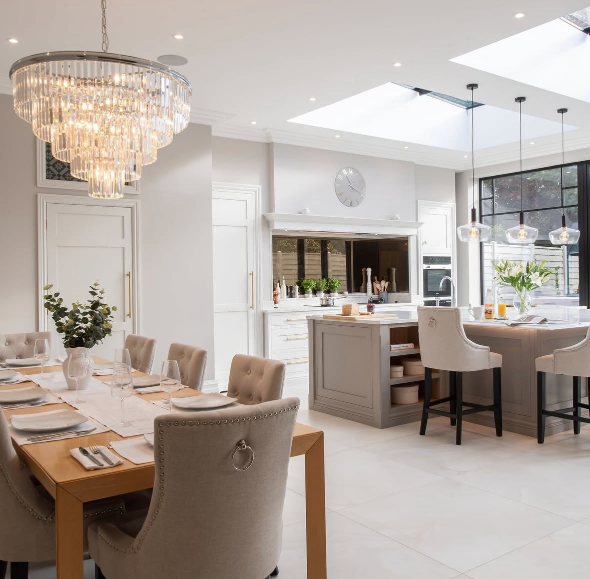 Beckenham circular chandelier creating refined crystal illumination in a high-end interior