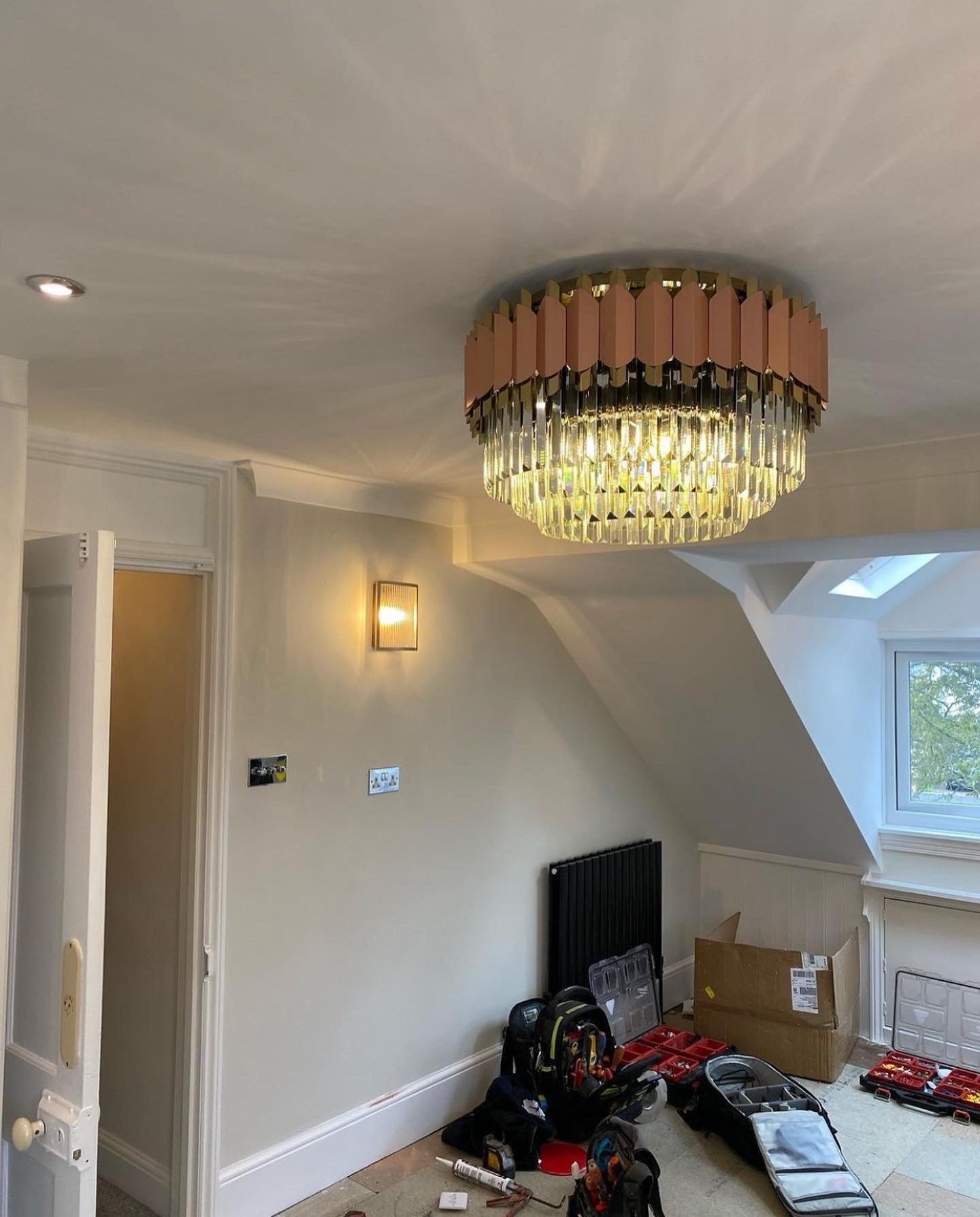 Luxury Bianca circular chandelier illuminating a refined modern interior with faceted crystal detailing