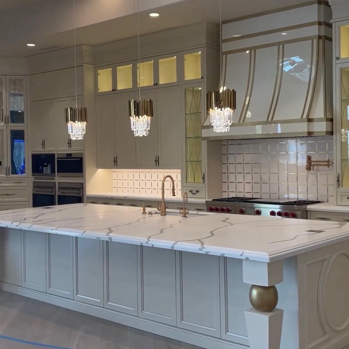 Boeotia pendant light illuminating a high-end interior with refined crystal detailing