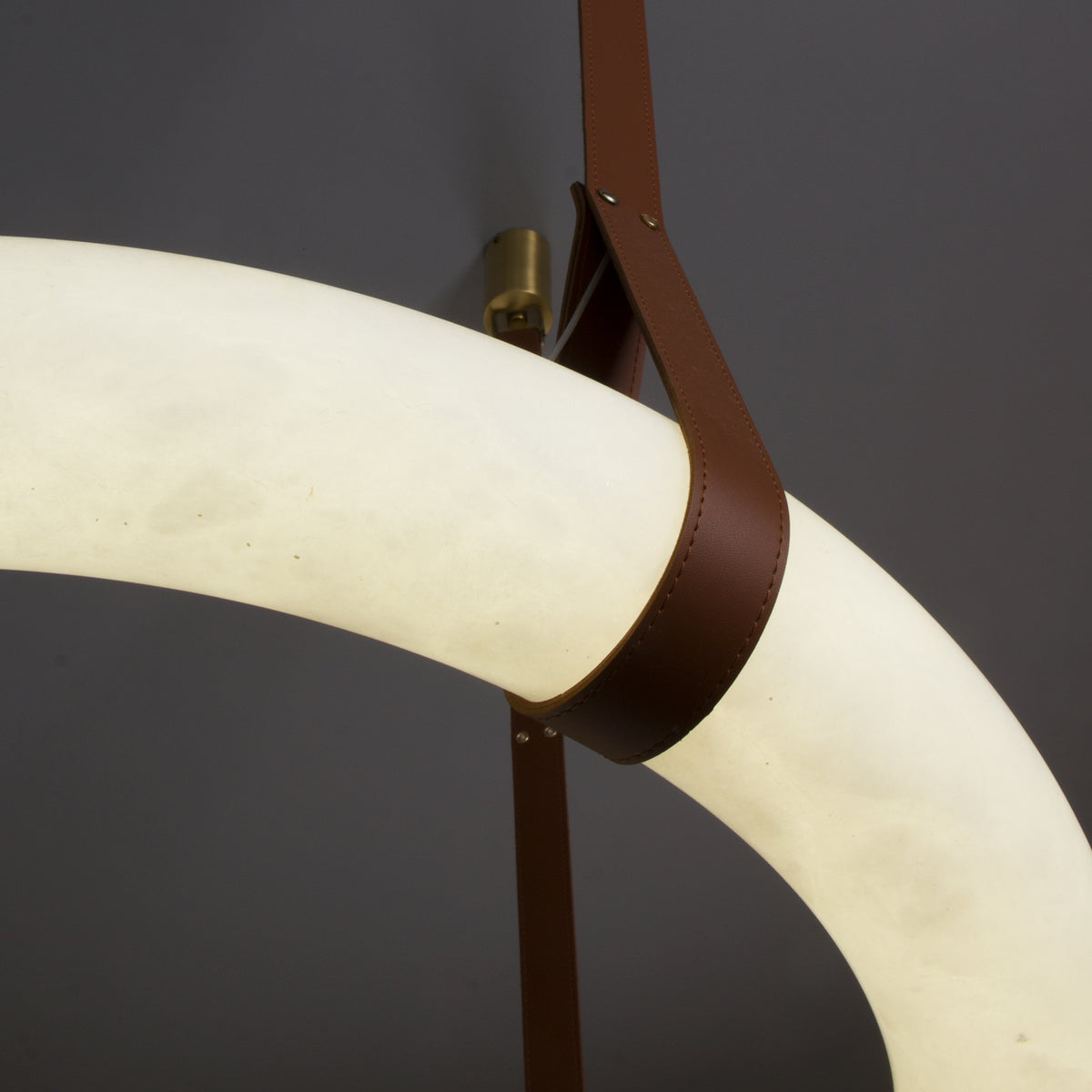 Detailed close-up of the Botticino Marble Ceiling Light showing the illuminated marble texture.