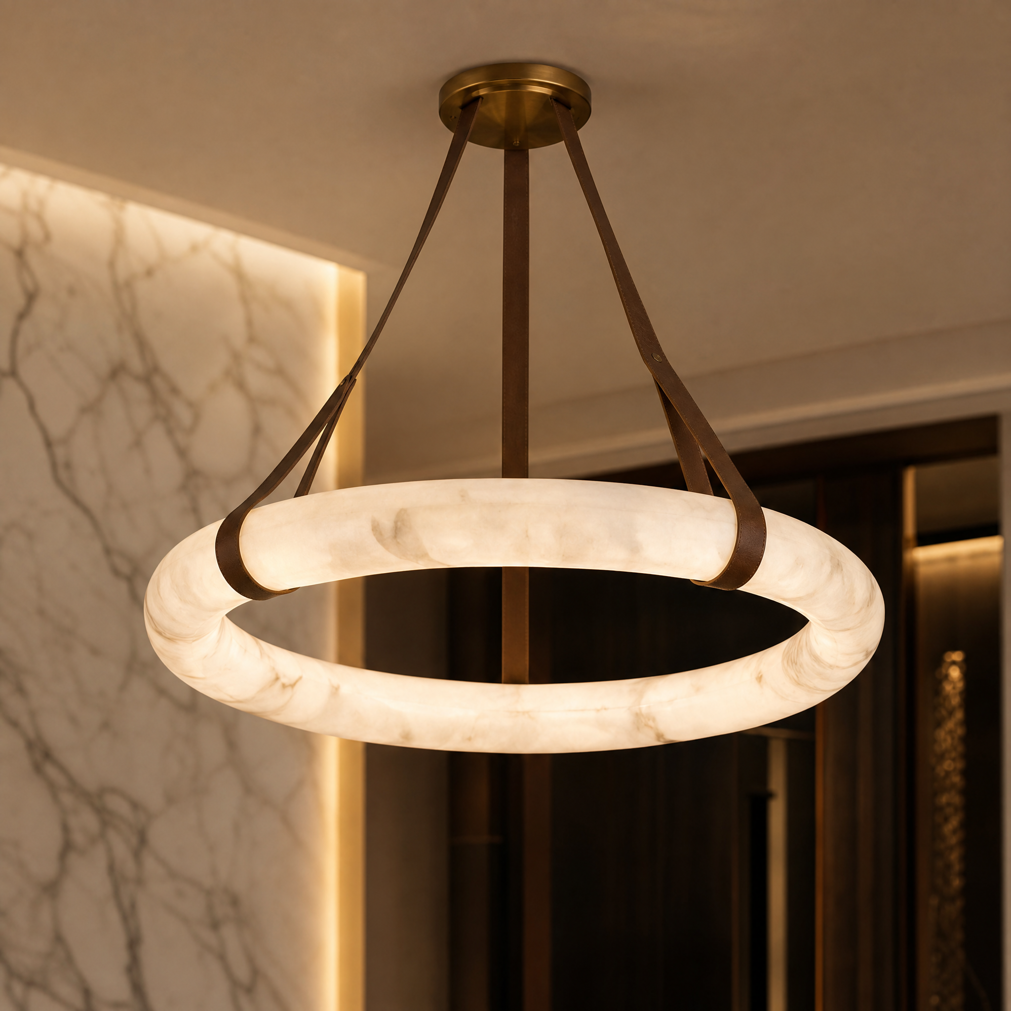 Close-up view of the Botticino marble texture and premium leather strap suspension of the circular chandelier.