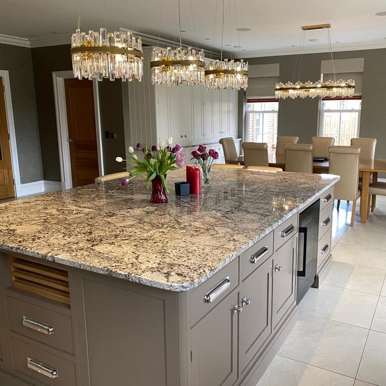 Brighouse circular chandelier suspended above a luxury kitchen island with crystal detailing