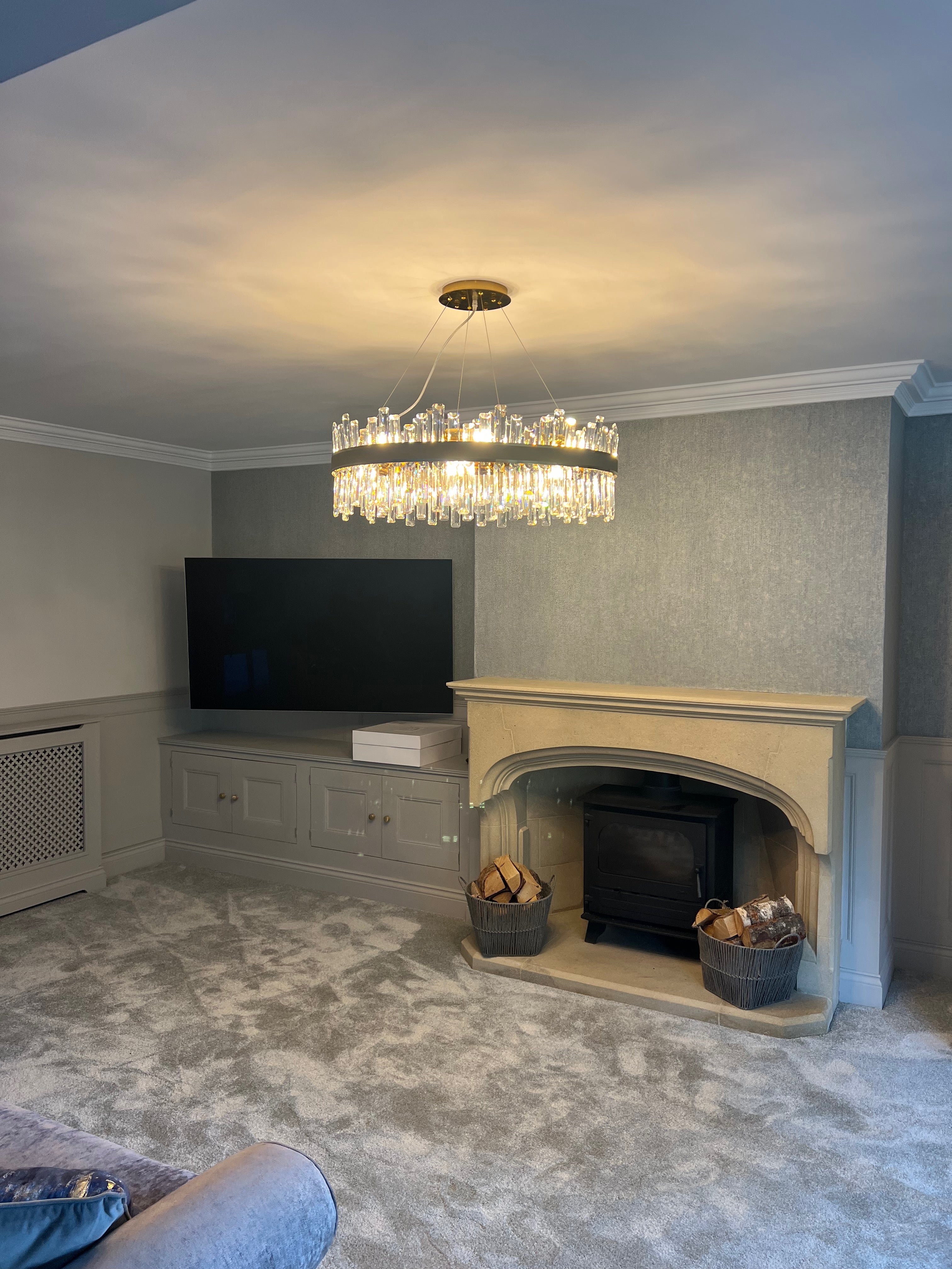 Brighouse circular chandelier installed in a luxury living room with refined crystal design