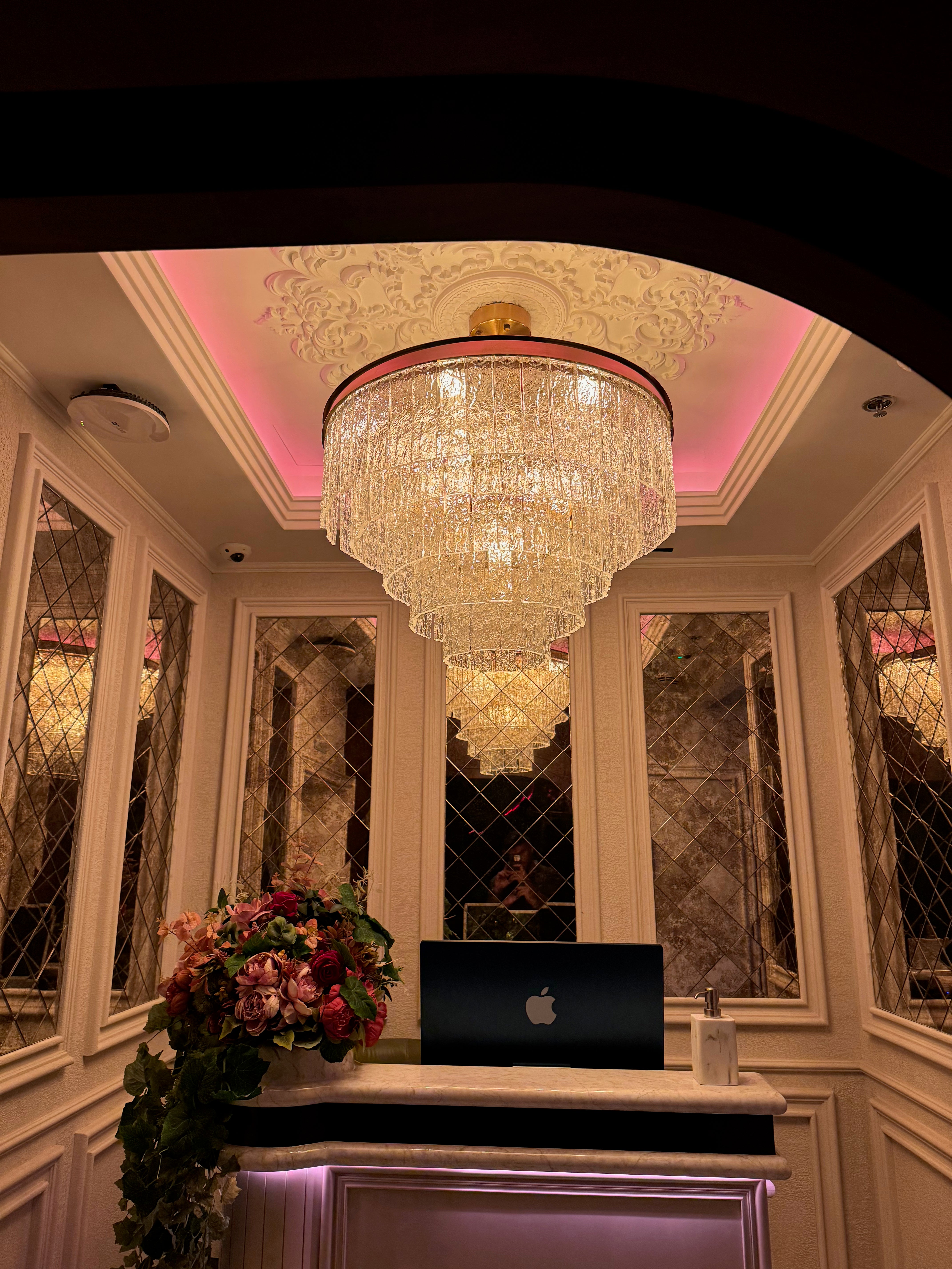 Cellini circular chandelier with multiple tiers of cracked textured rectangular crystals creating a dramatic luxury lighting centrepiece