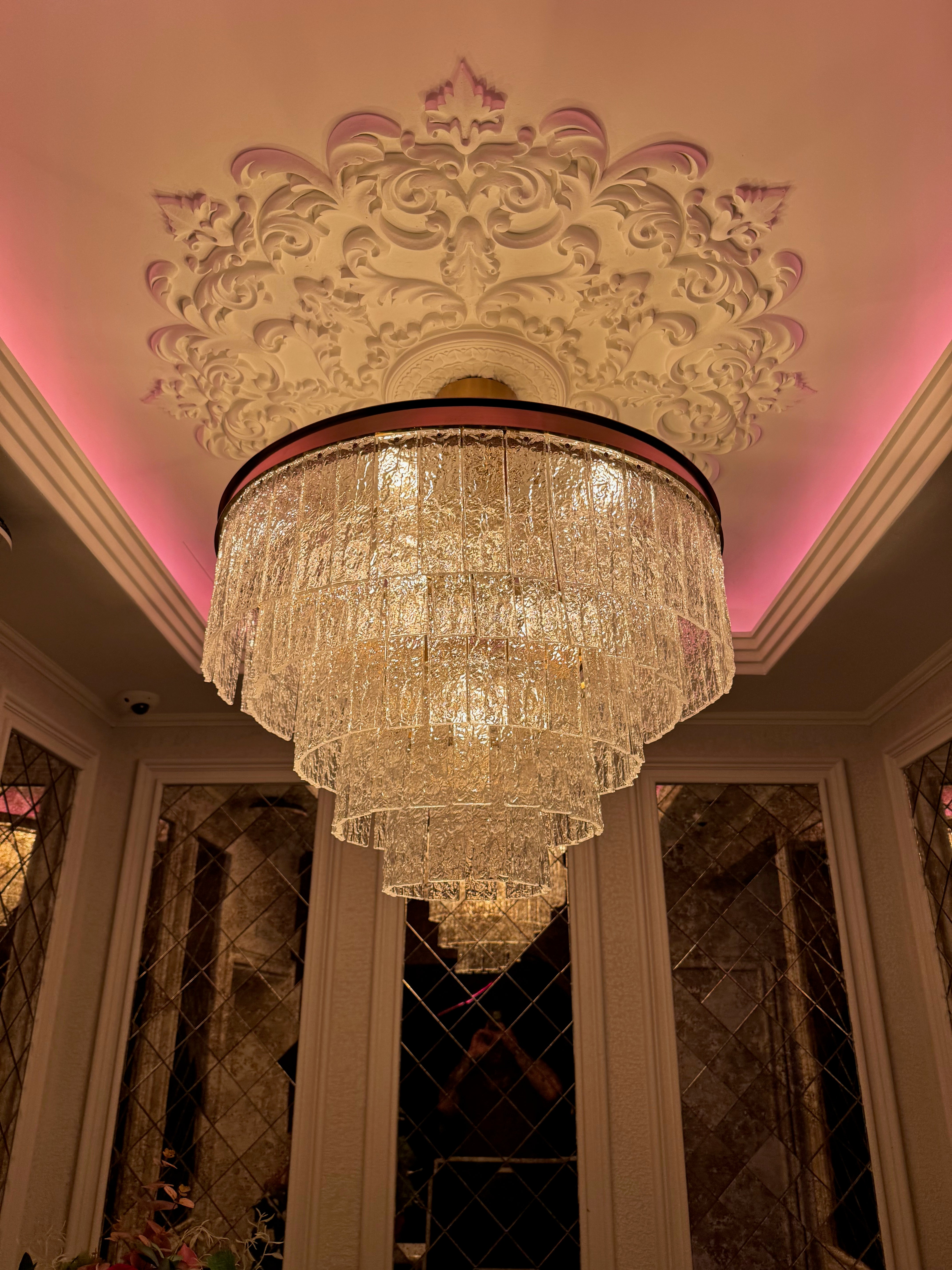 Close-up of cracked textured rectangular crystals on the Cellini circular chandelier highlighting refined luxury craftsmanship