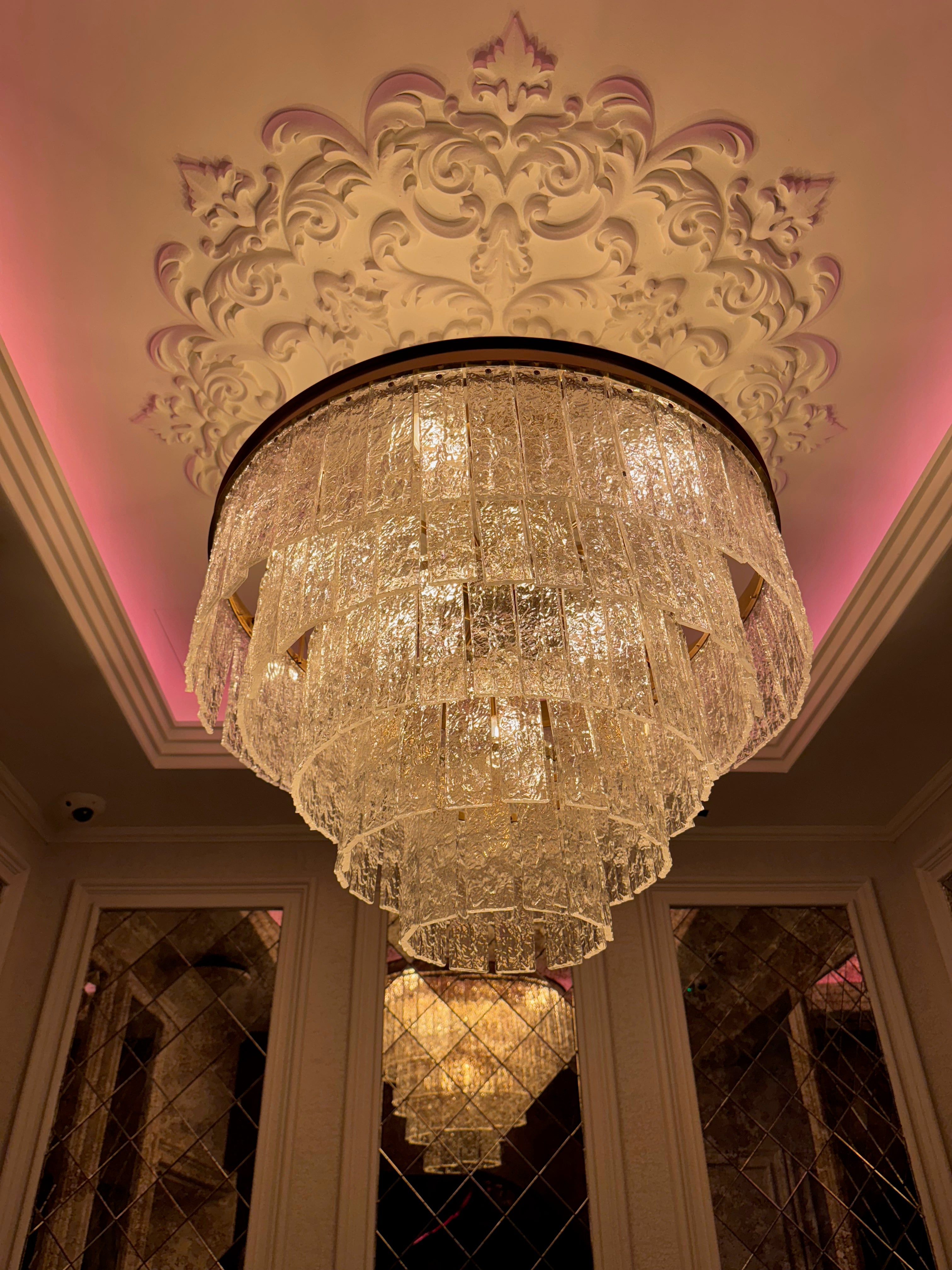 Elegant Cellini circular chandelier featuring multi-tier cracked textured rectangle crystals for sophisticated interior lighting