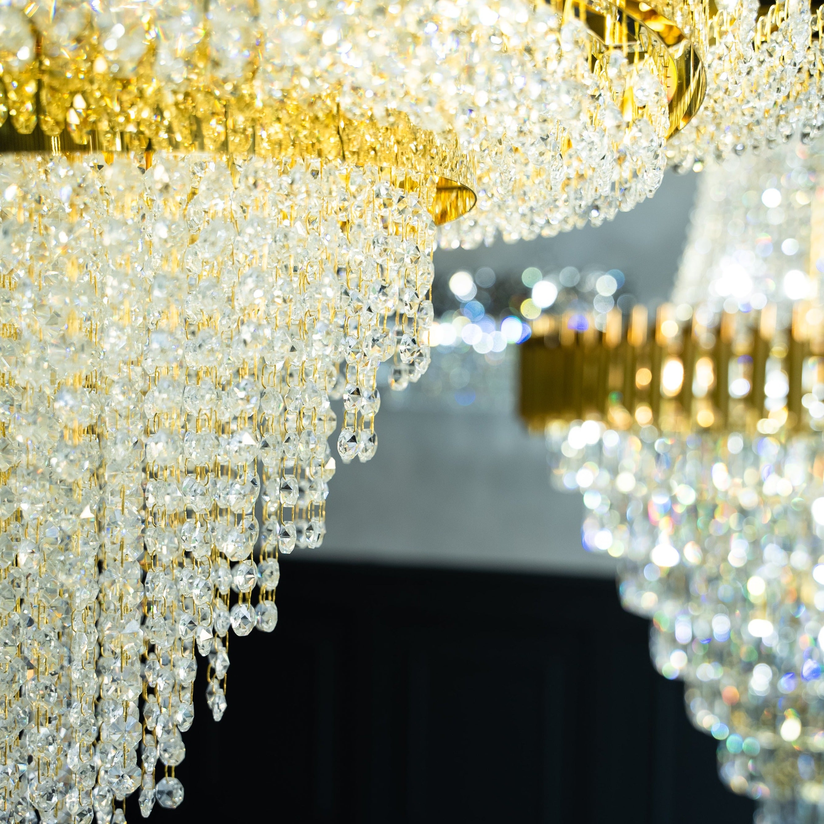 Polished metal frame and crystal detailing of the Champs Elysees circular chandelier viewed from below