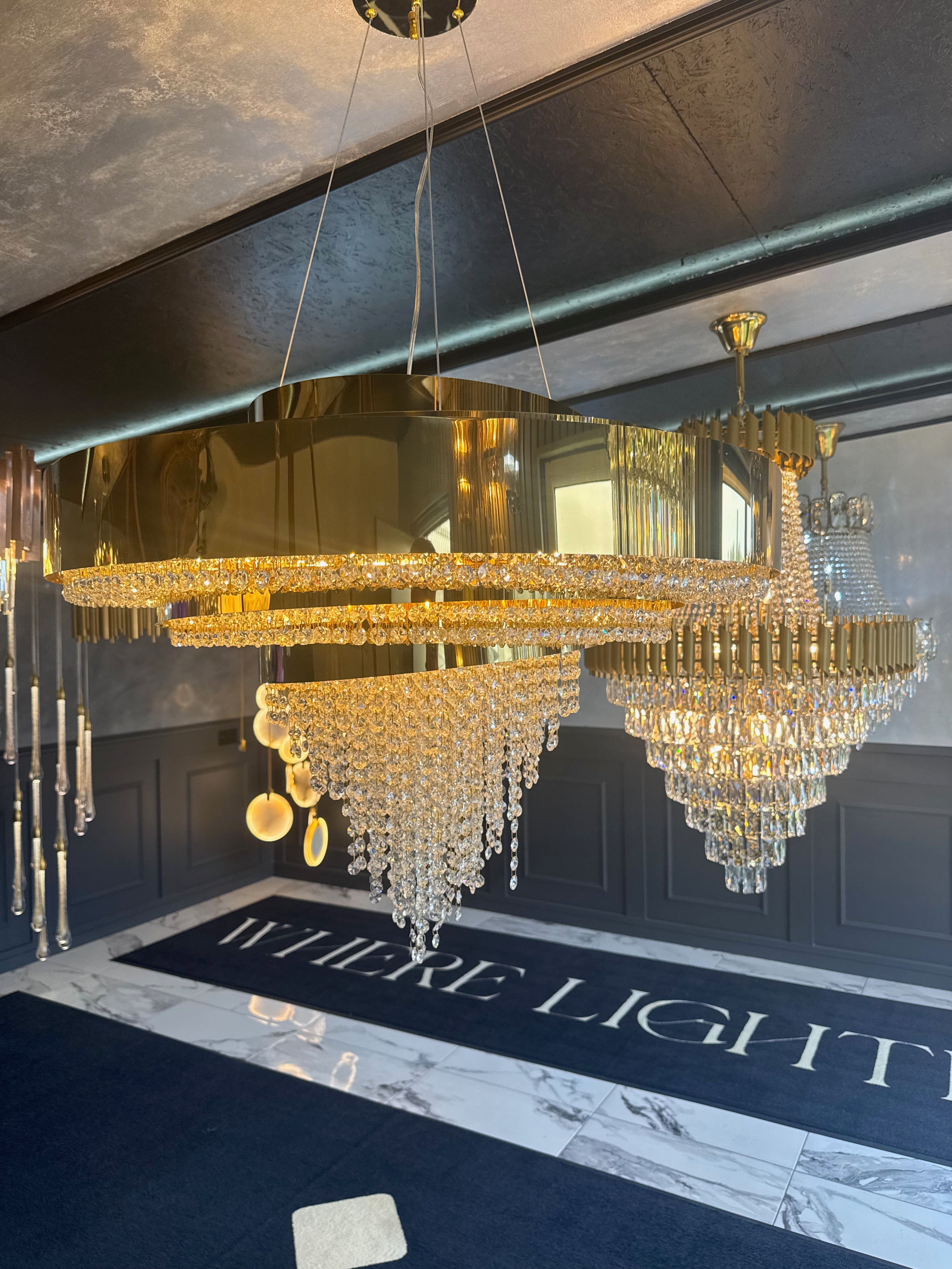 Close-up of the Champs Elysees circular chandelier featuring octagon crystal chains and refined luxury detailing