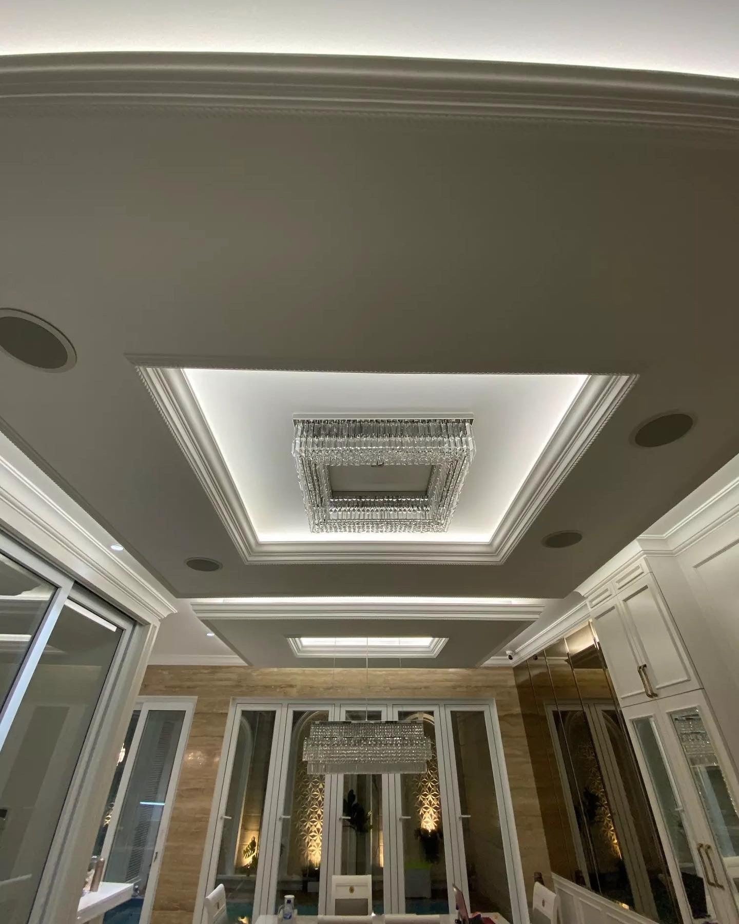 Close up of Chartrons square ceiling light showing precision cut crystal and contemporary square frame