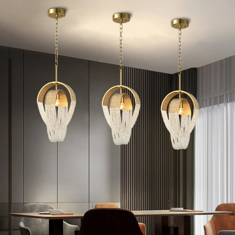 cindi pendant lighting trio with crystal octagon chain in elegant dining room