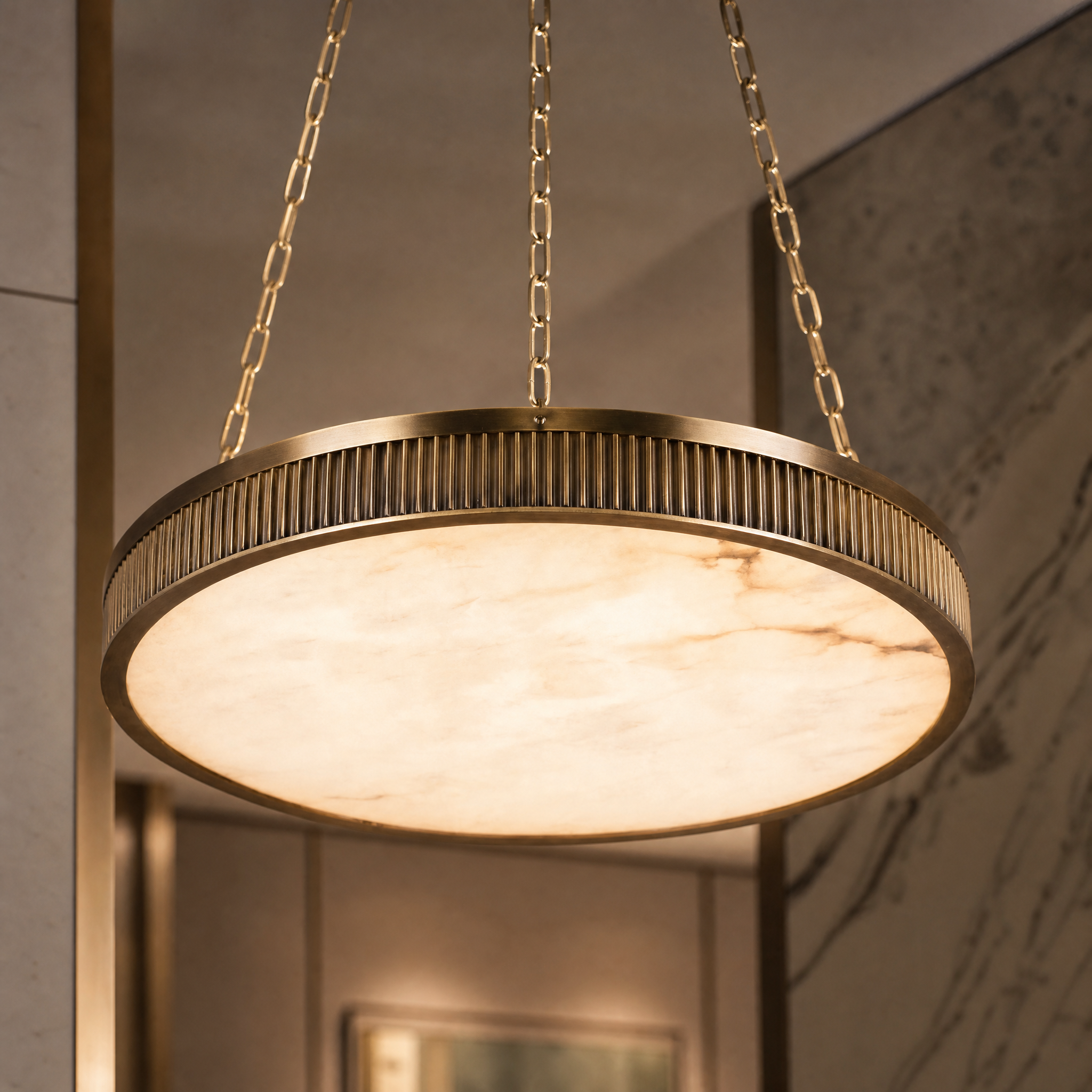 Close up detail of the handcrafted Spanish alabaster shade and antique brass finish on the Cipriano chandelier