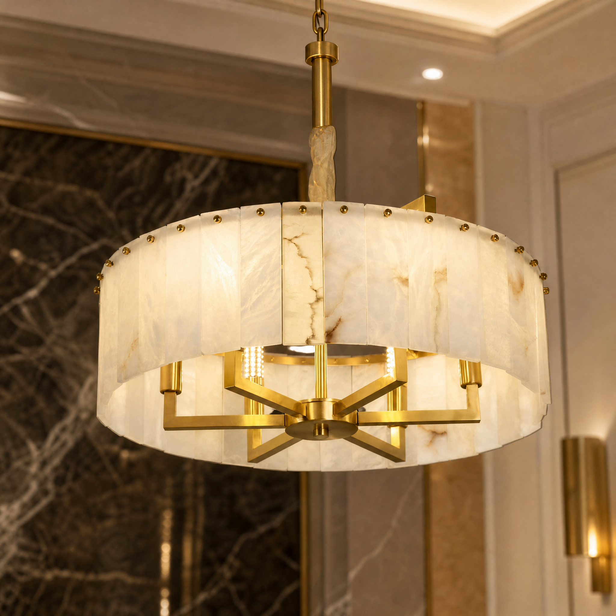 Close-up of the exquisite hand-carved marble texture and sleek frame of the Classico circular chandelier.