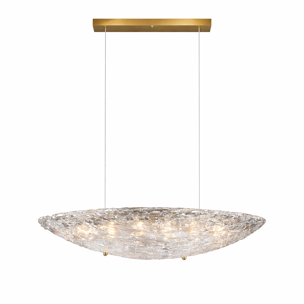 Close-up detail of the VORELLI Cascata pendant light, accentuating the fluid, wave-like organic patterns in the sculpted glass and its soft ambient glow.