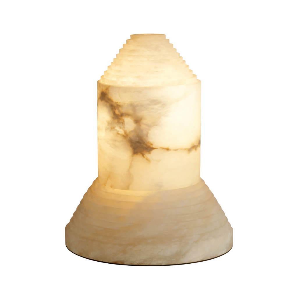 Close-up of the Stratto Marble Table Lamp by VORELLI, highlighting the rich, natural veining and warm, ambient glow of the architectural tiered design.