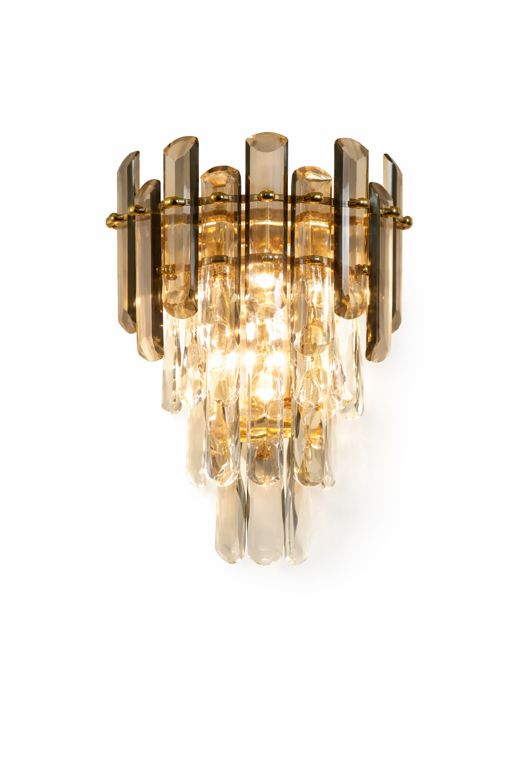 Close-up of the VORELLI Lugano Wall Light showing the intricate diamond-cut crystals creating a brilliant, refractive light effect.