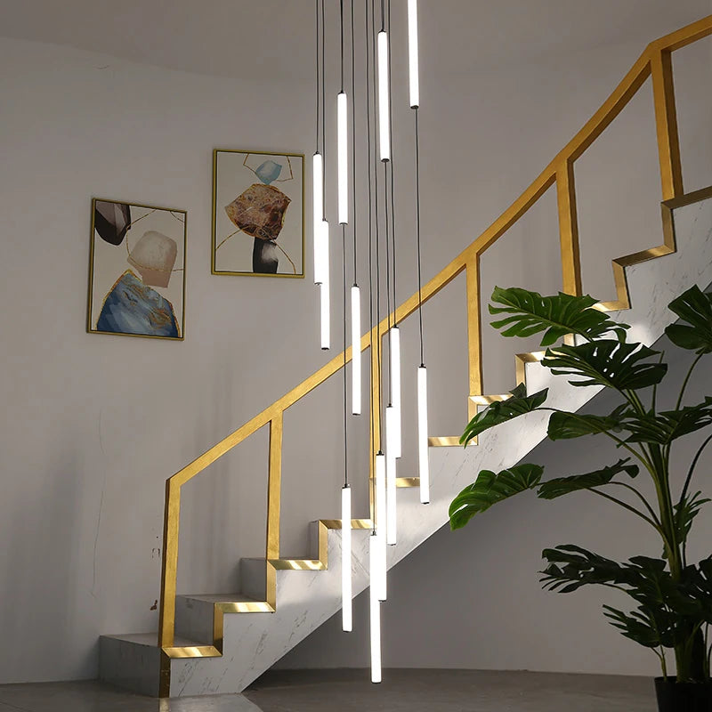 cowley pendant staircase chandelier arranged in cascading formation along modern staircase