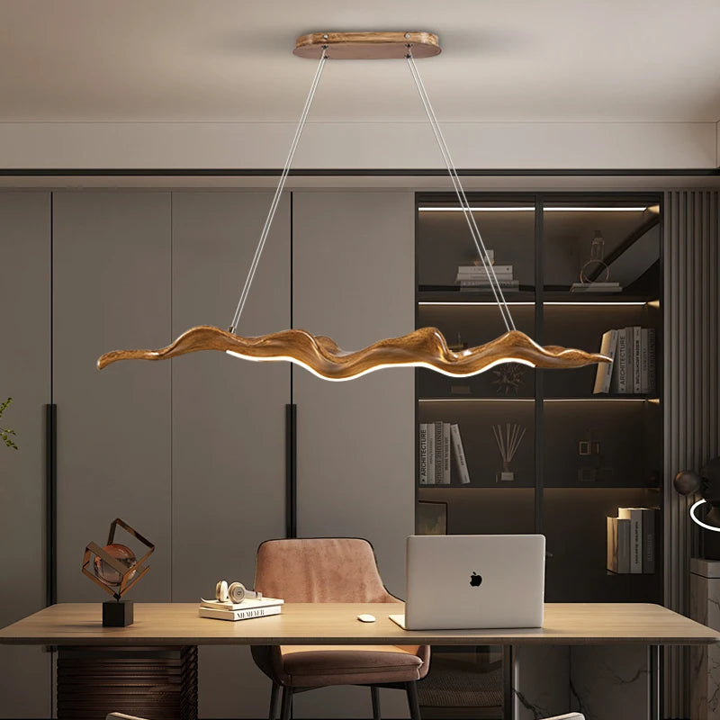 modern sculptural chandelier with soft warm lighting in interior setting