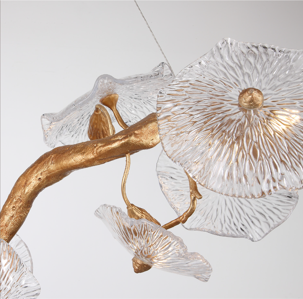 Distinctive presence of the Penny Leaf Ceiling Light, its cluster of delicate glass leaves forming a unique, calming focal point in a statement interior space.