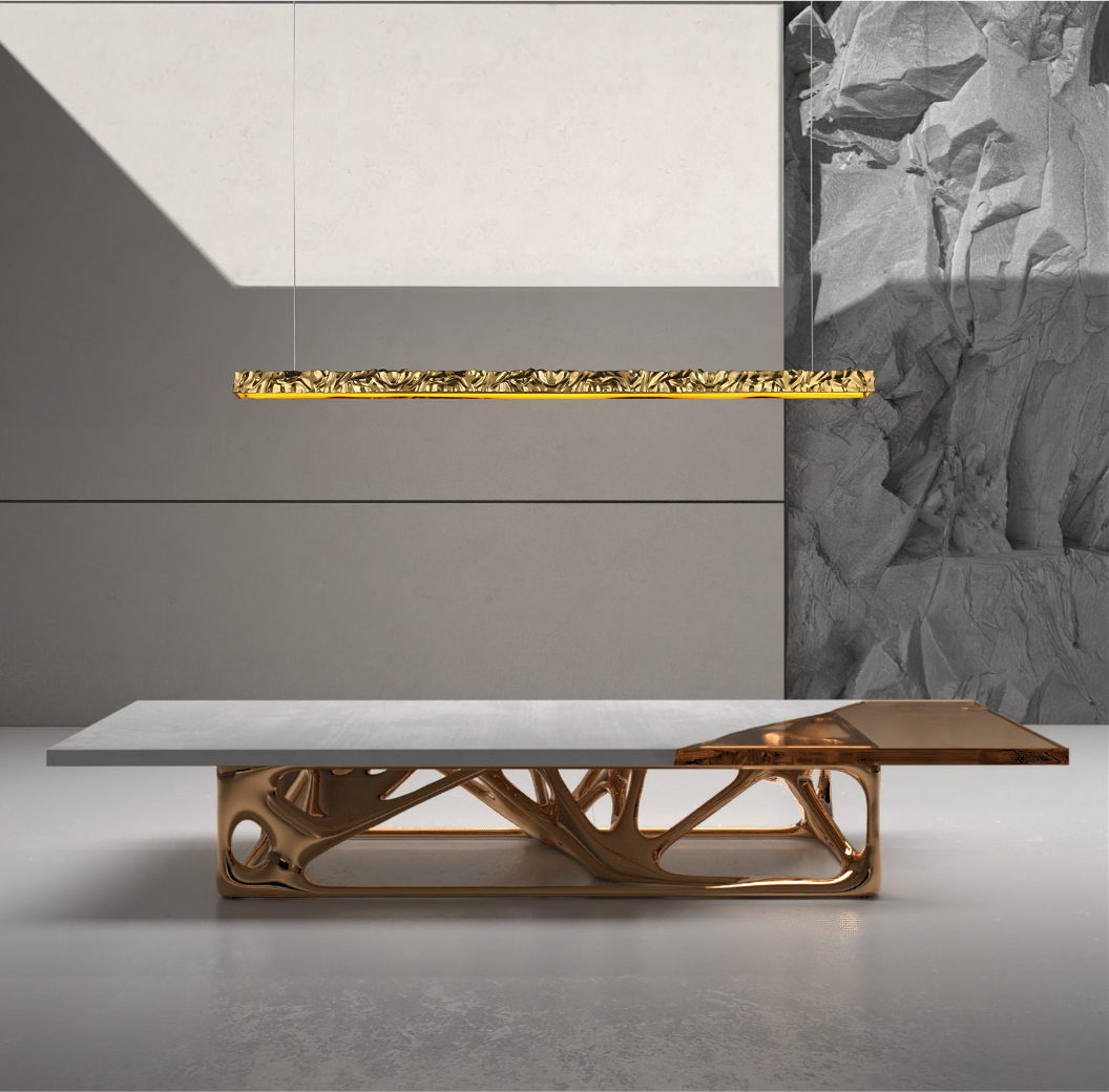 Ecliptica rectangular chandelier by VORELLI® featuring a minimalist textured gold design above a contemporary dining table